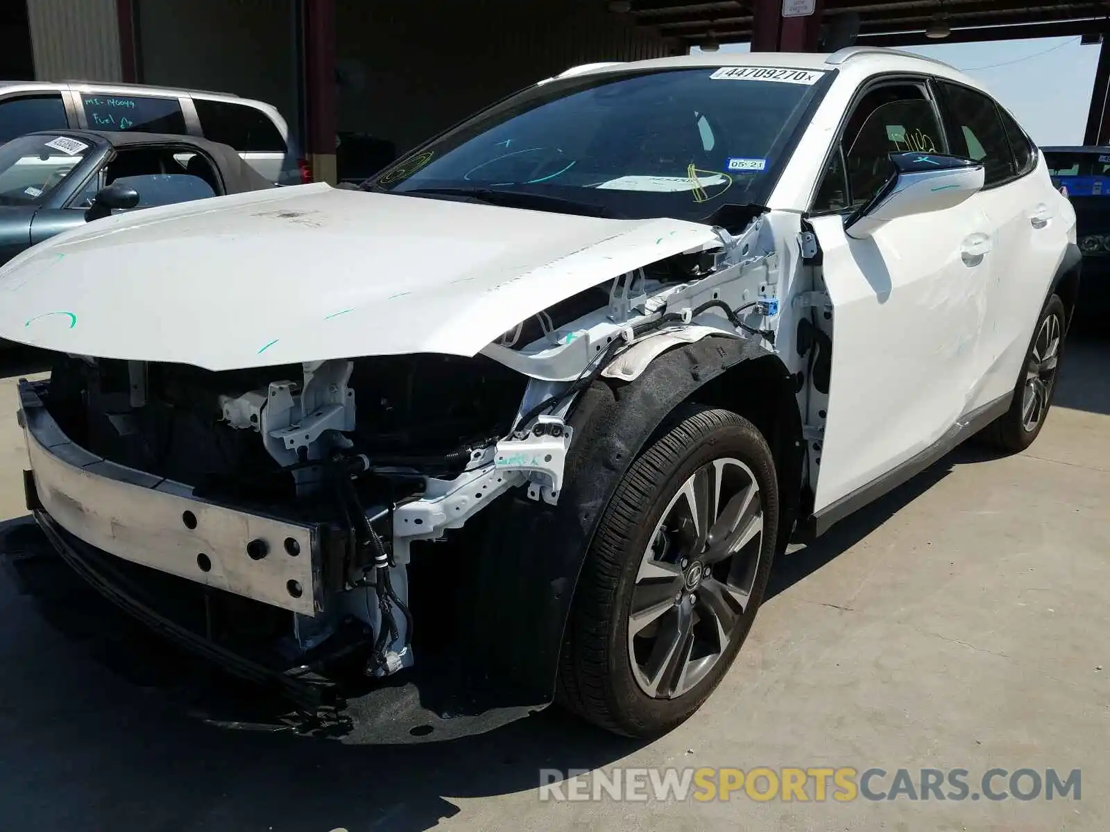 2 Photograph of a damaged car JTHY3JBH2K2009825 LEXUS UX 200 2019