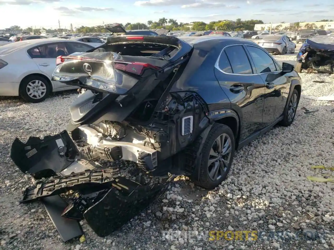 4 Photograph of a damaged car JTHY3JBH5K2005400 LEXUS UX 200 2019