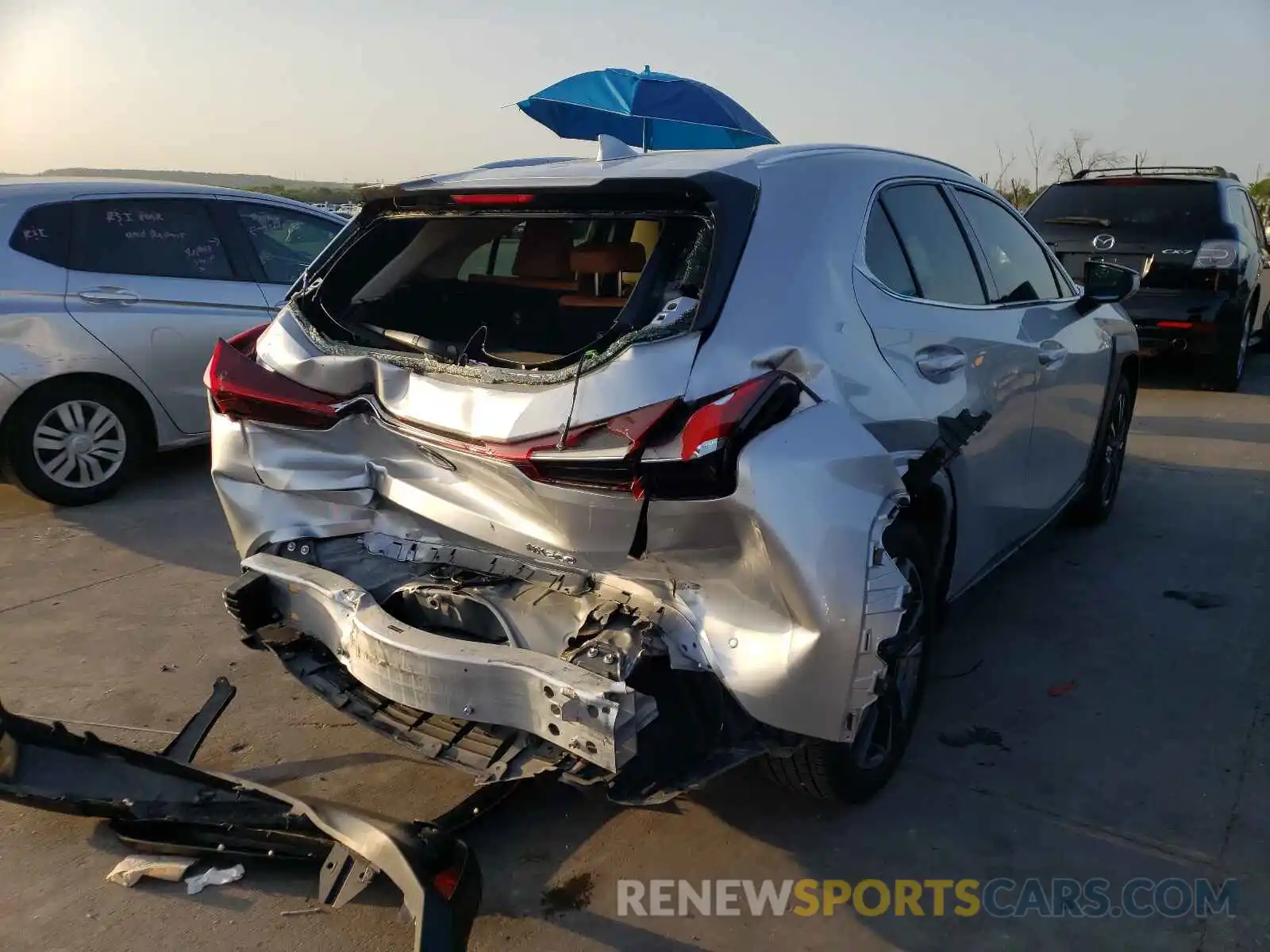 4 Photograph of a damaged car JTHX3JBHXL2030094 LEXUS UX 200 2020