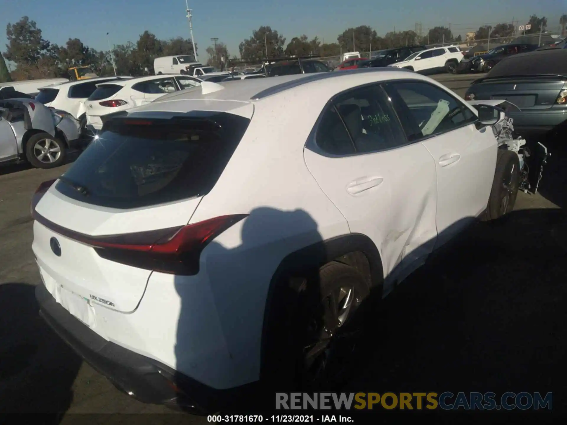 4 Photograph of a damaged car JTHE9JBHXM2041572 LEXUS UX 2021