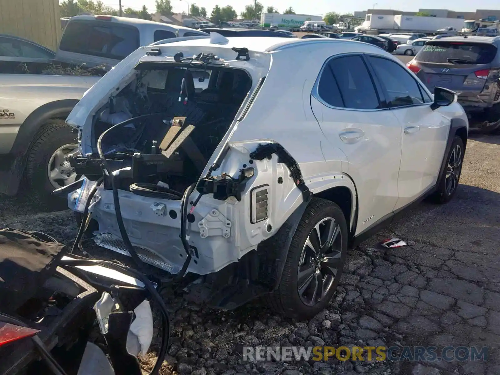 4 Photograph of a damaged car JTHU9JBH5K2010321 LEXUS UX 250H 2019