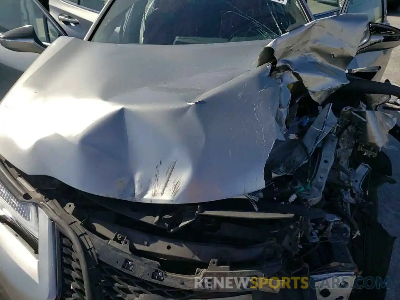 7 Photograph of a damaged car JTHU9JBH6K2009548 LEXUS UX 250H 2019