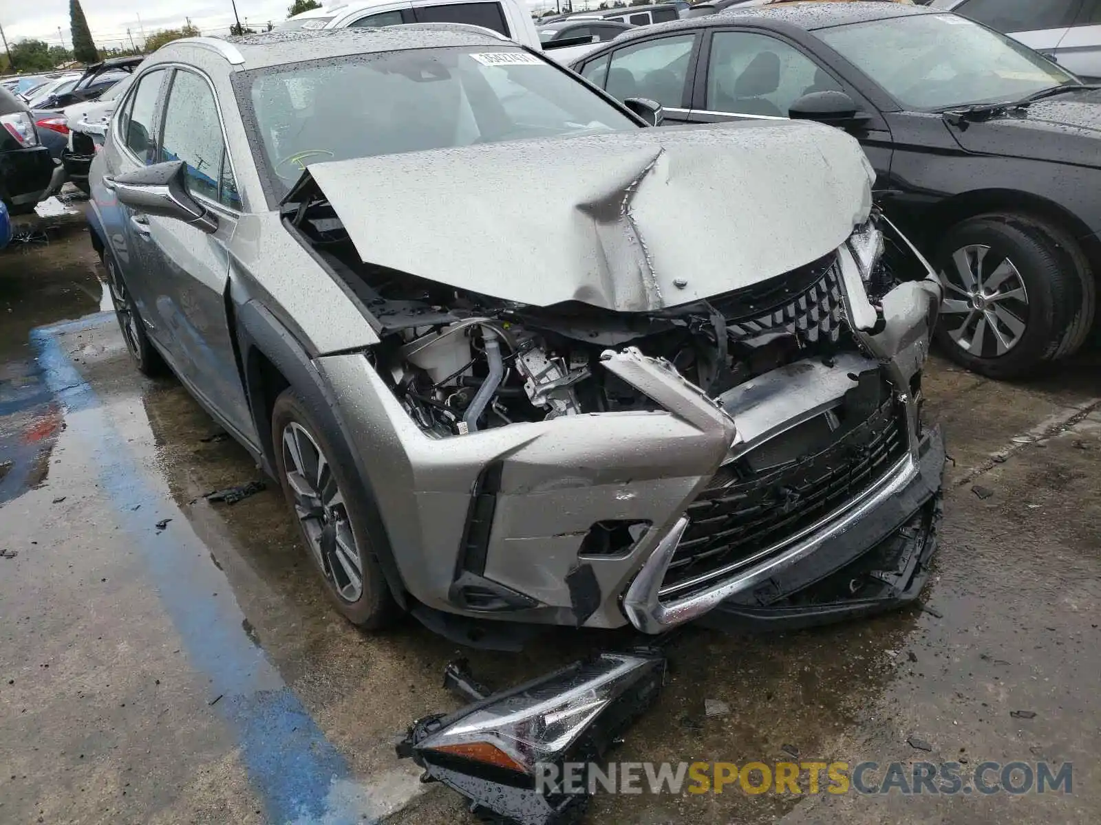1 Фотография поврежденного автомобиля JTHU9JBHXK2017779 LEXUS UX 250H 2019