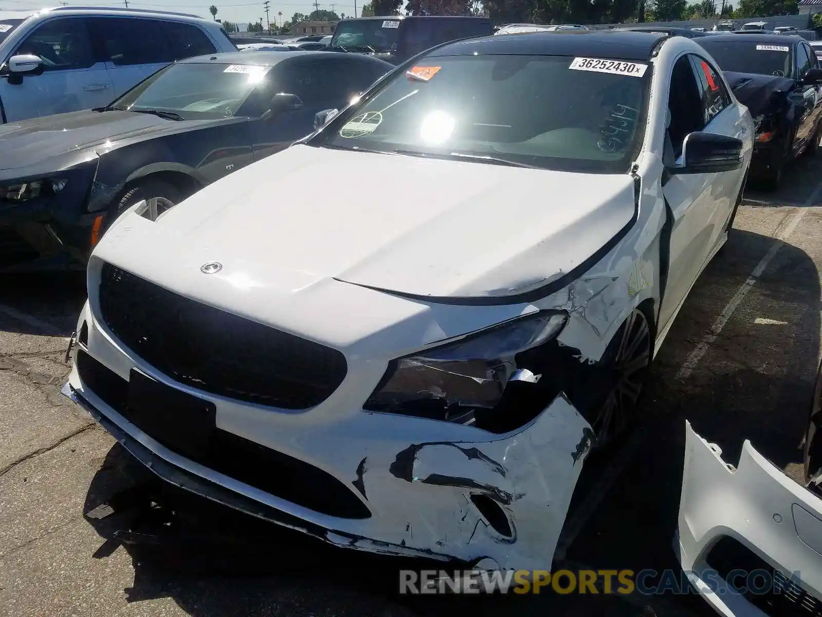 2 Photograph of a damaged car WDDSJ4EB0KN769780 MERCEDES-BENZ C CLASS 2019