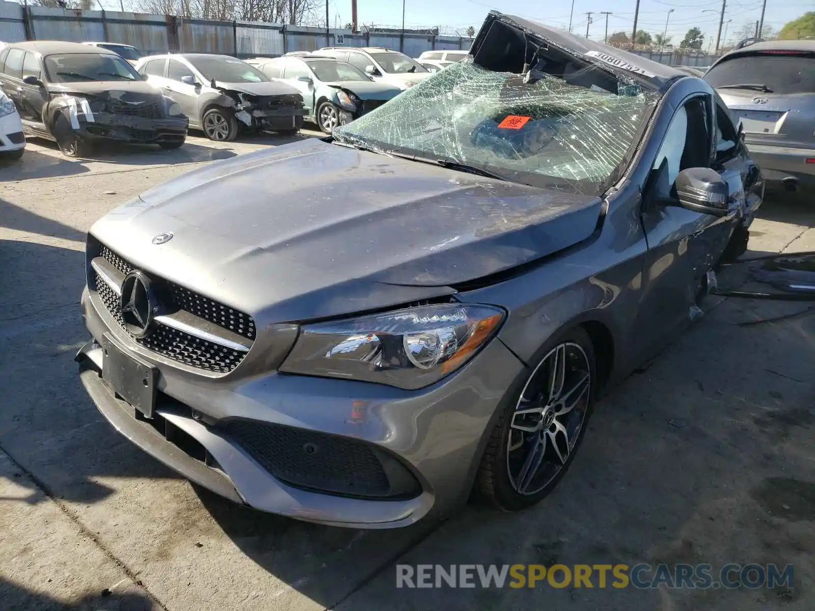 2 Photograph of a damaged car WDDSJ4EB0KN776499 MERCEDES-BENZ C CLASS 2019