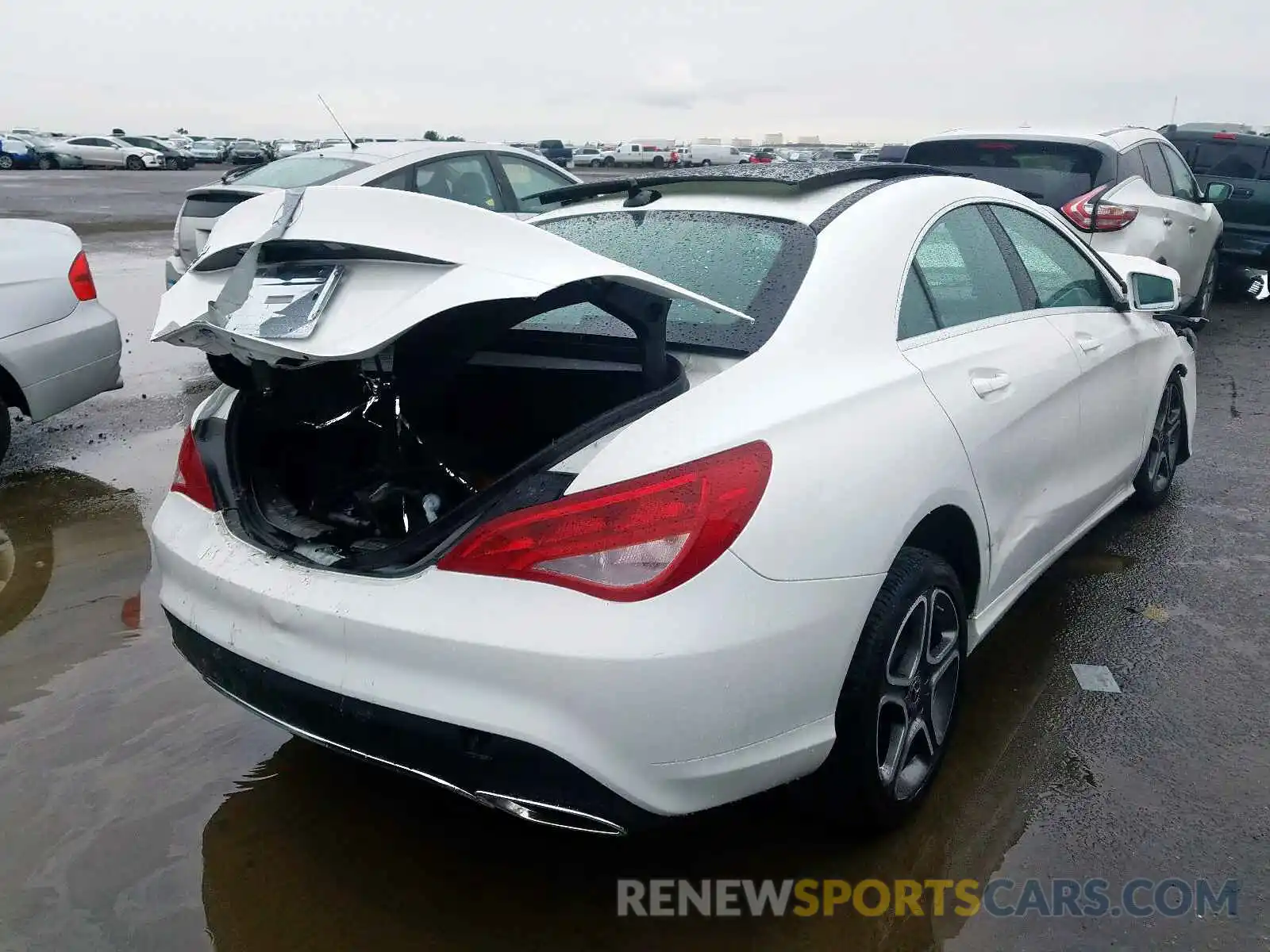 4 Photograph of a damaged car WDDSJ4EB5KN771394 MERCEDES-BENZ C CLASS 2019