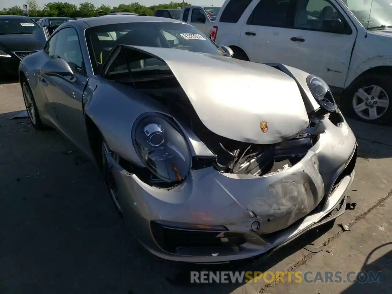 1 Photograph of a damaged car WP0AA2A96KS104185 PORSCHE 911 2019