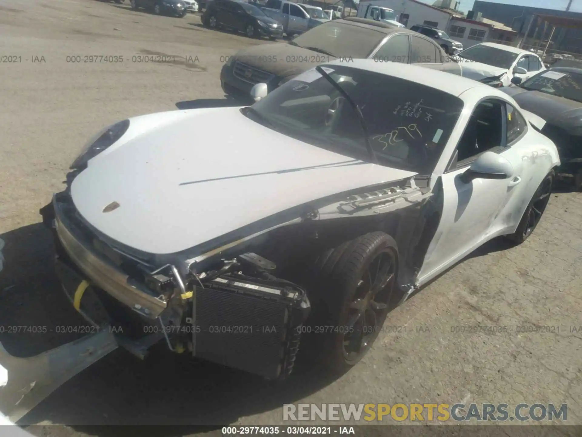 2 Photograph of a damaged car WP0AB2A94KS115389 PORSCHE 911 2019