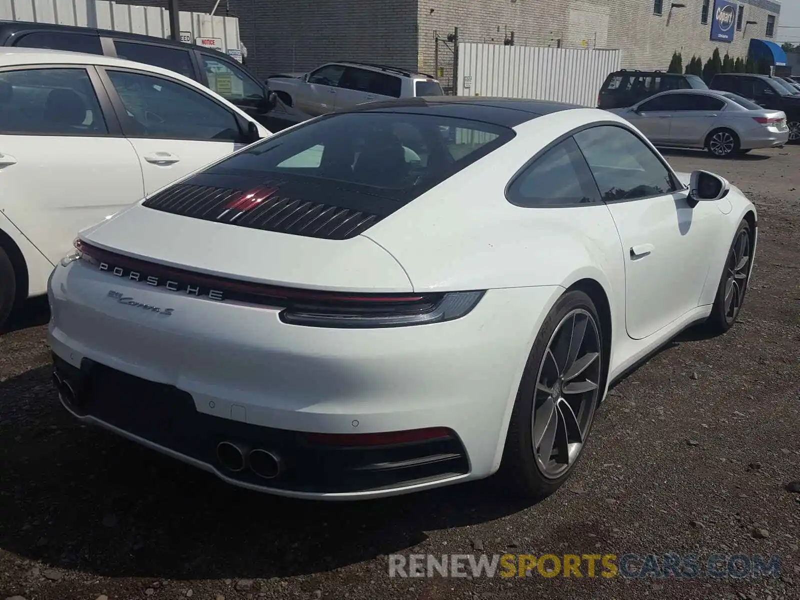 4 Photograph of a damaged car WP0AB2A93LS227487 PORSCHE 911 2020