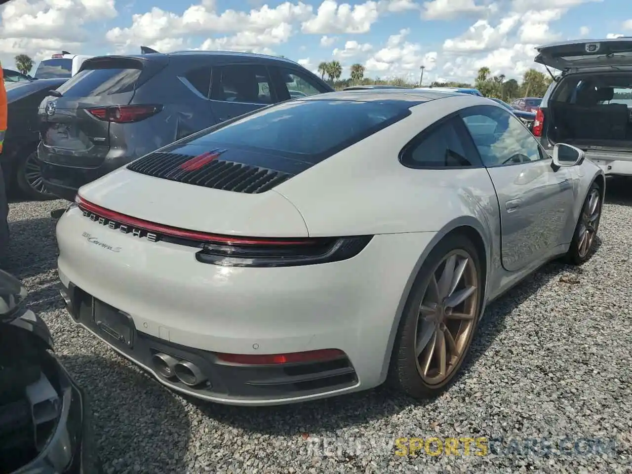 4 Photograph of a damaged car WP0AB2A94LS227630 PORSCHE 911 2020