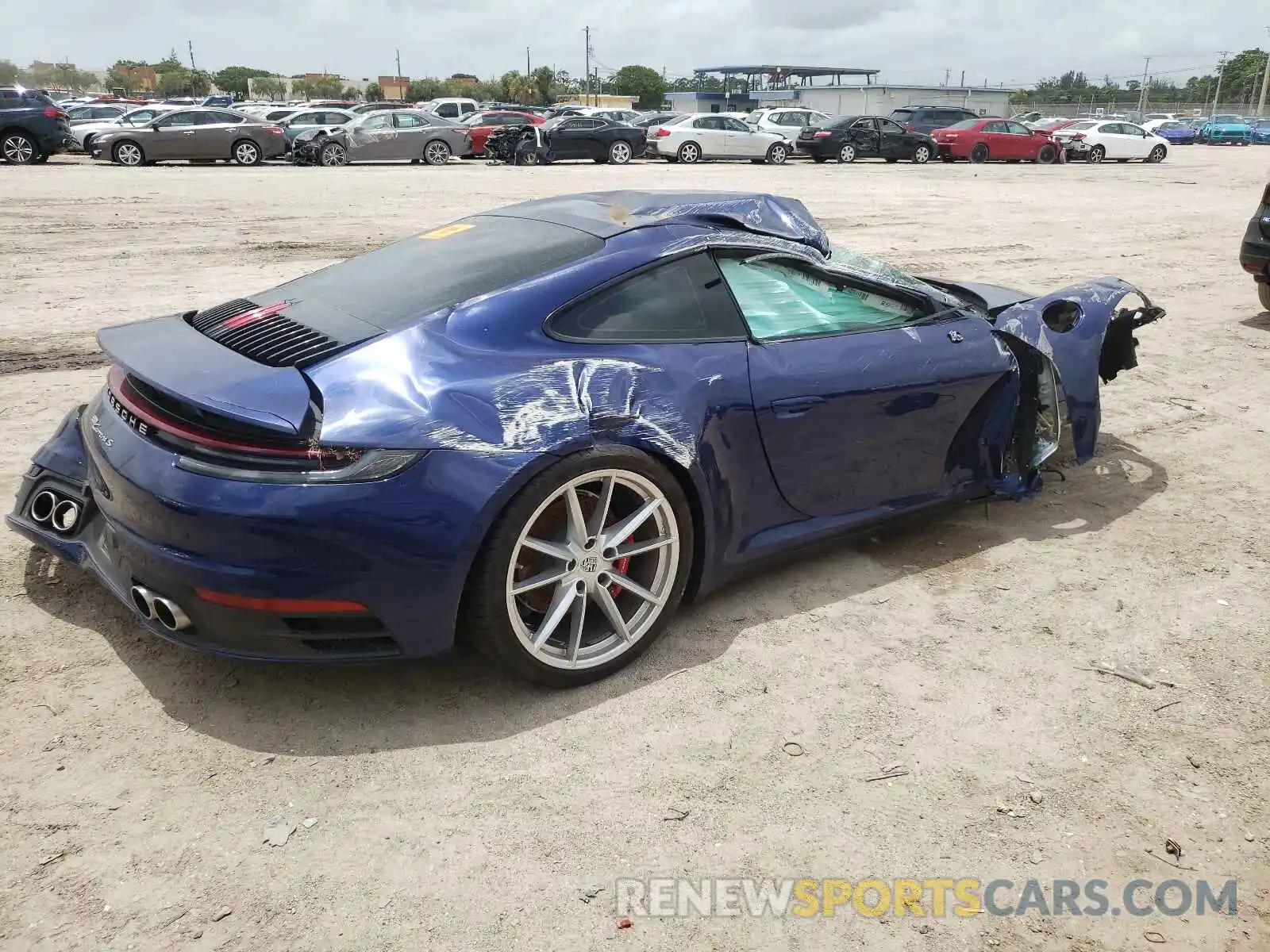 4 Photograph of a damaged car WP0AB2A94LS228275 PORSCHE 911 2020