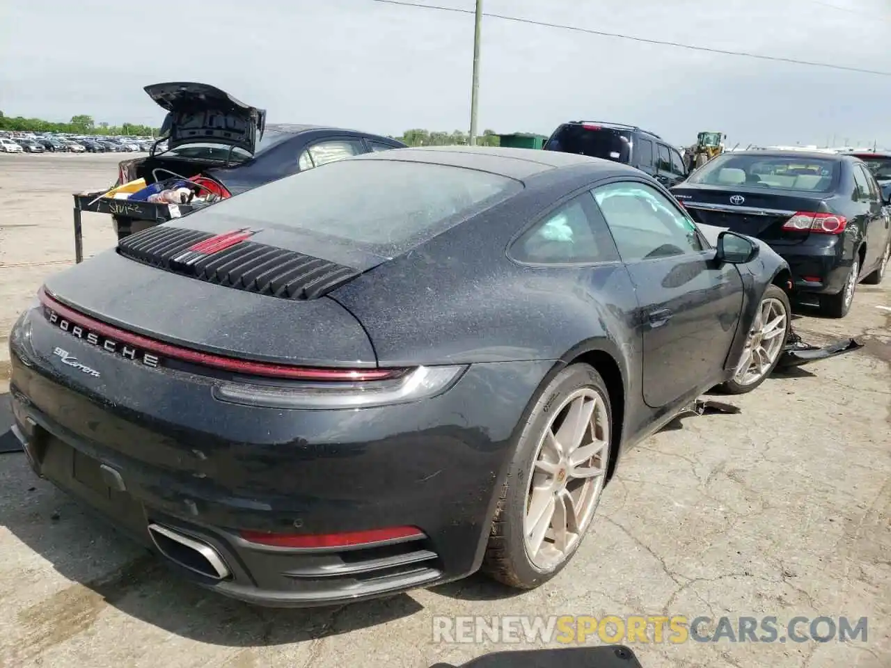 4 Photograph of a damaged car WP0AA2A90MS205127 PORSCHE 911 2021