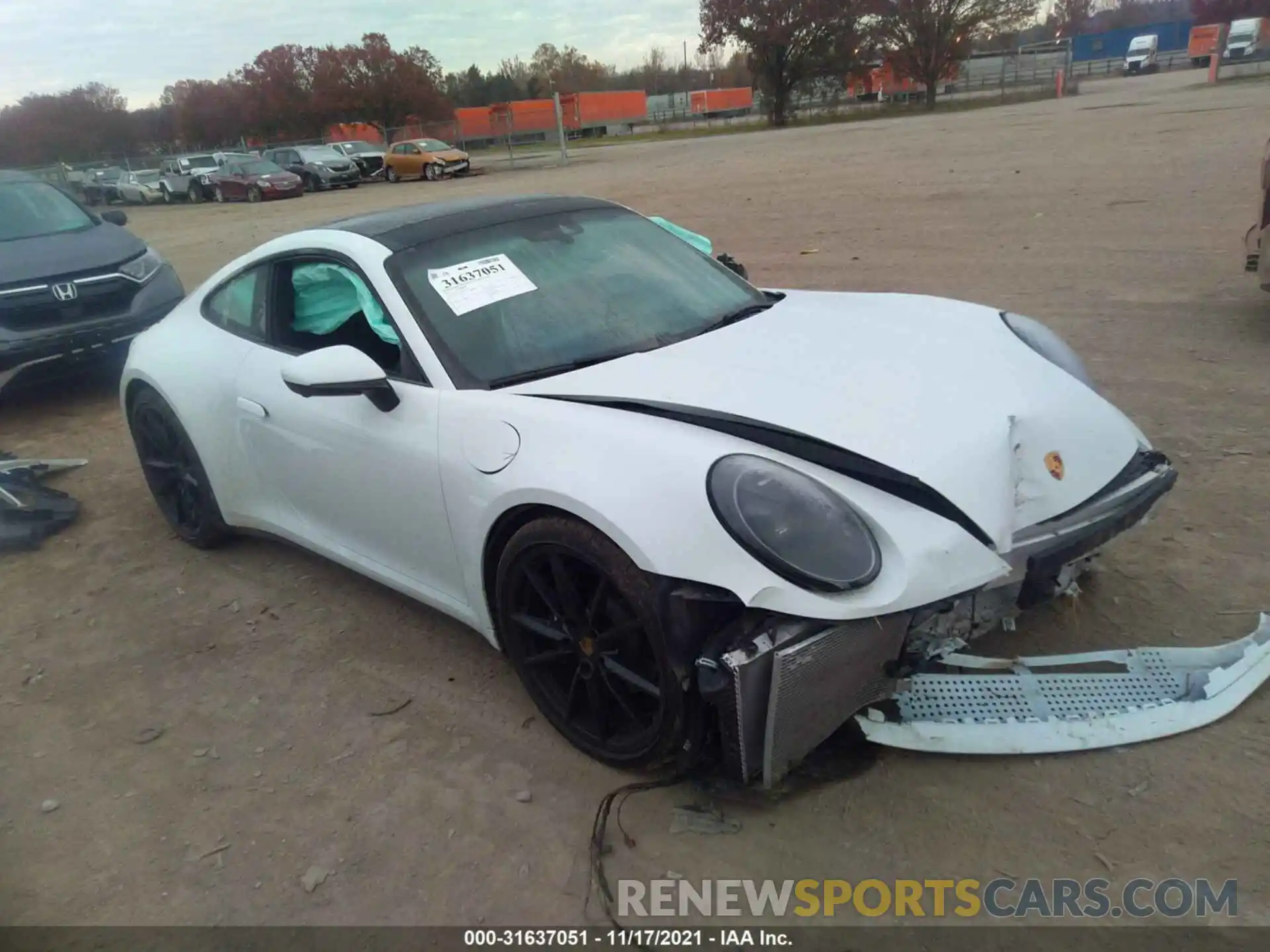 1 Photograph of a damaged car WP0AA2A94MS205275 PORSCHE 911 2021