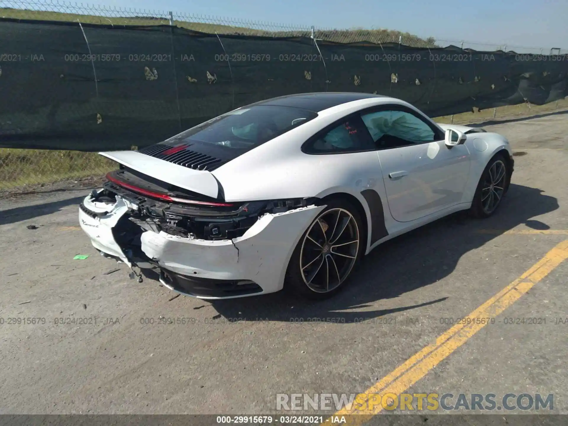 4 Photograph of a damaged car WP0AA2A98MS205148 PORSCHE 911 2021