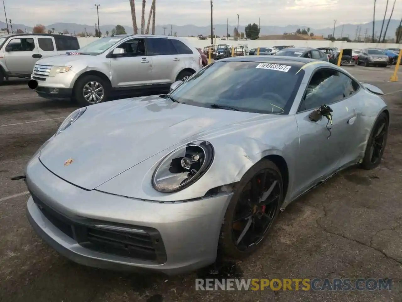 2 Photograph of a damaged car WP0AB2A93MS222341 PORSCHE 911 2021