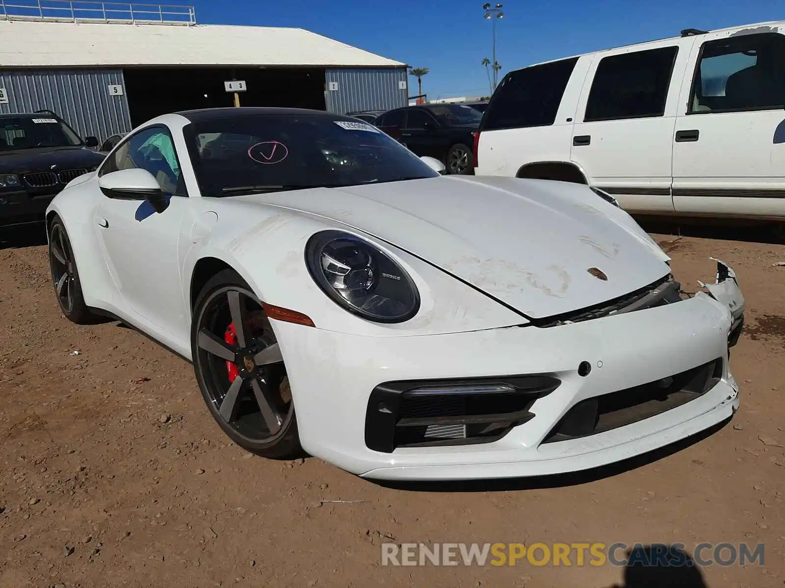 1 Photograph of a damaged car WP0AB2AP1MS221110 PORSCHE 911 2021