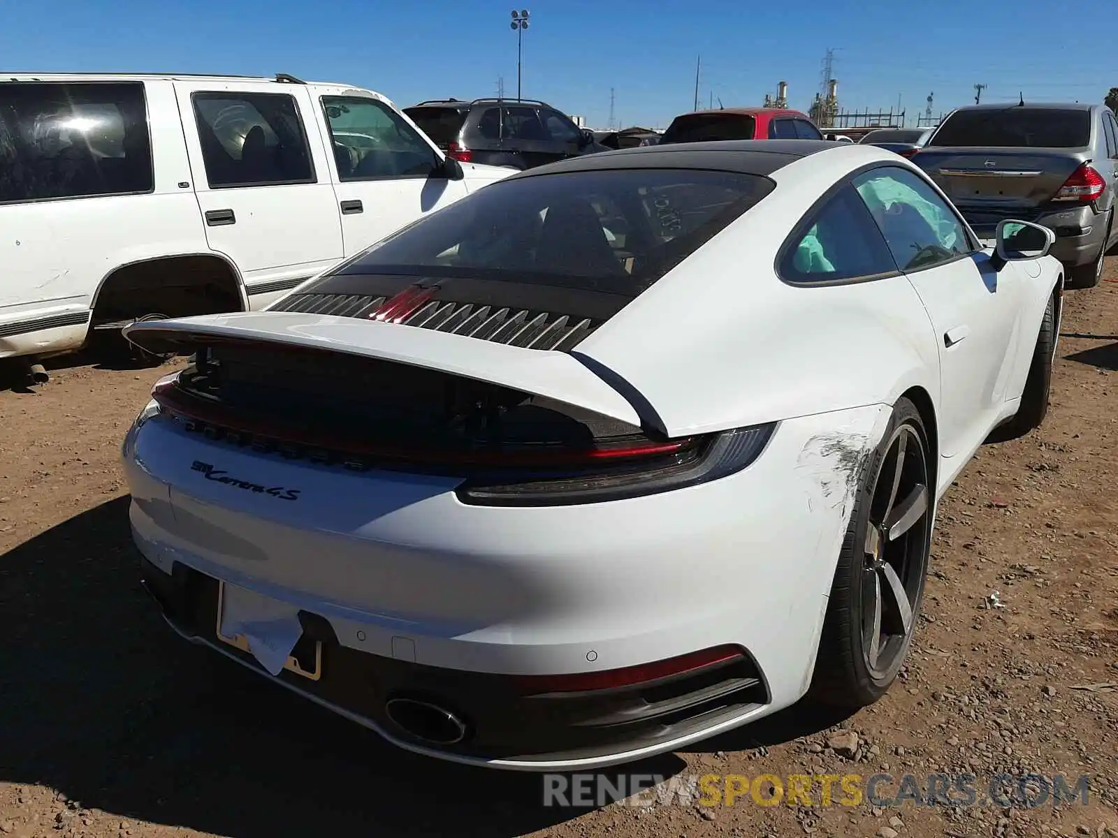 4 Photograph of a damaged car WP0AB2AP1MS221110 PORSCHE 911 2021