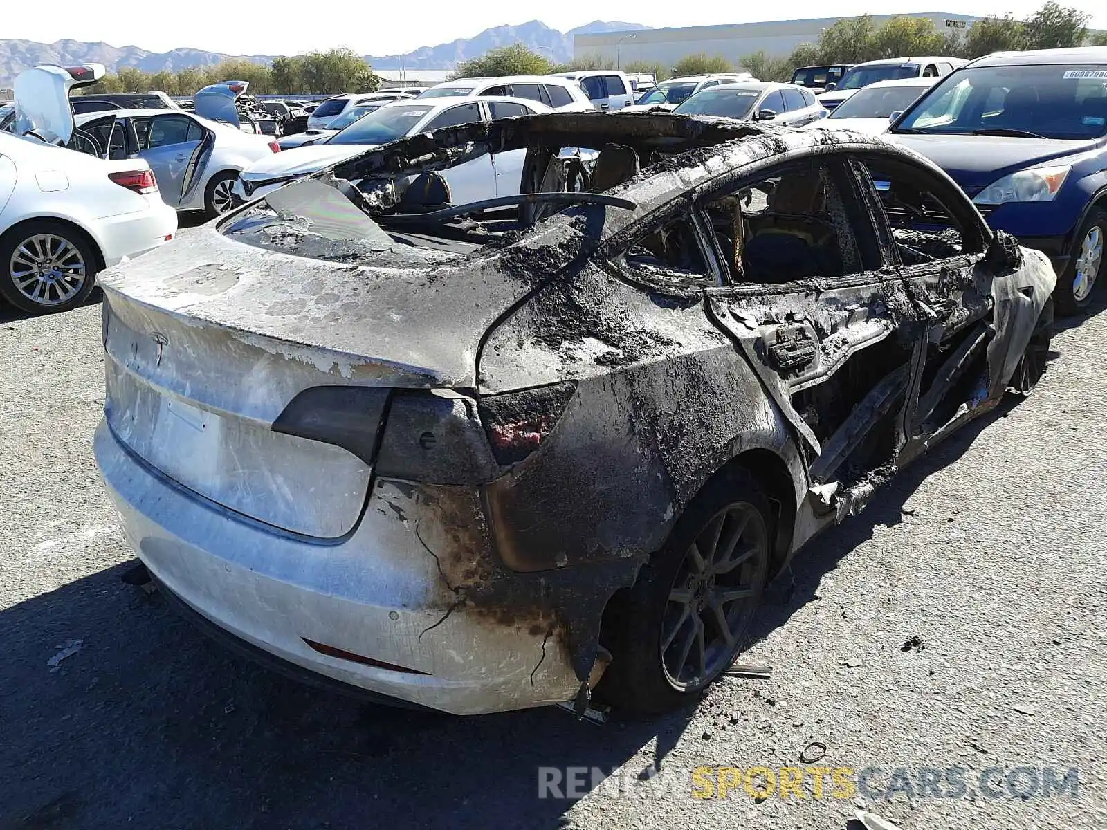 4 Photograph of a damaged car 1YJ3E1EAXKF299913 TESLA MODEL 3 2019