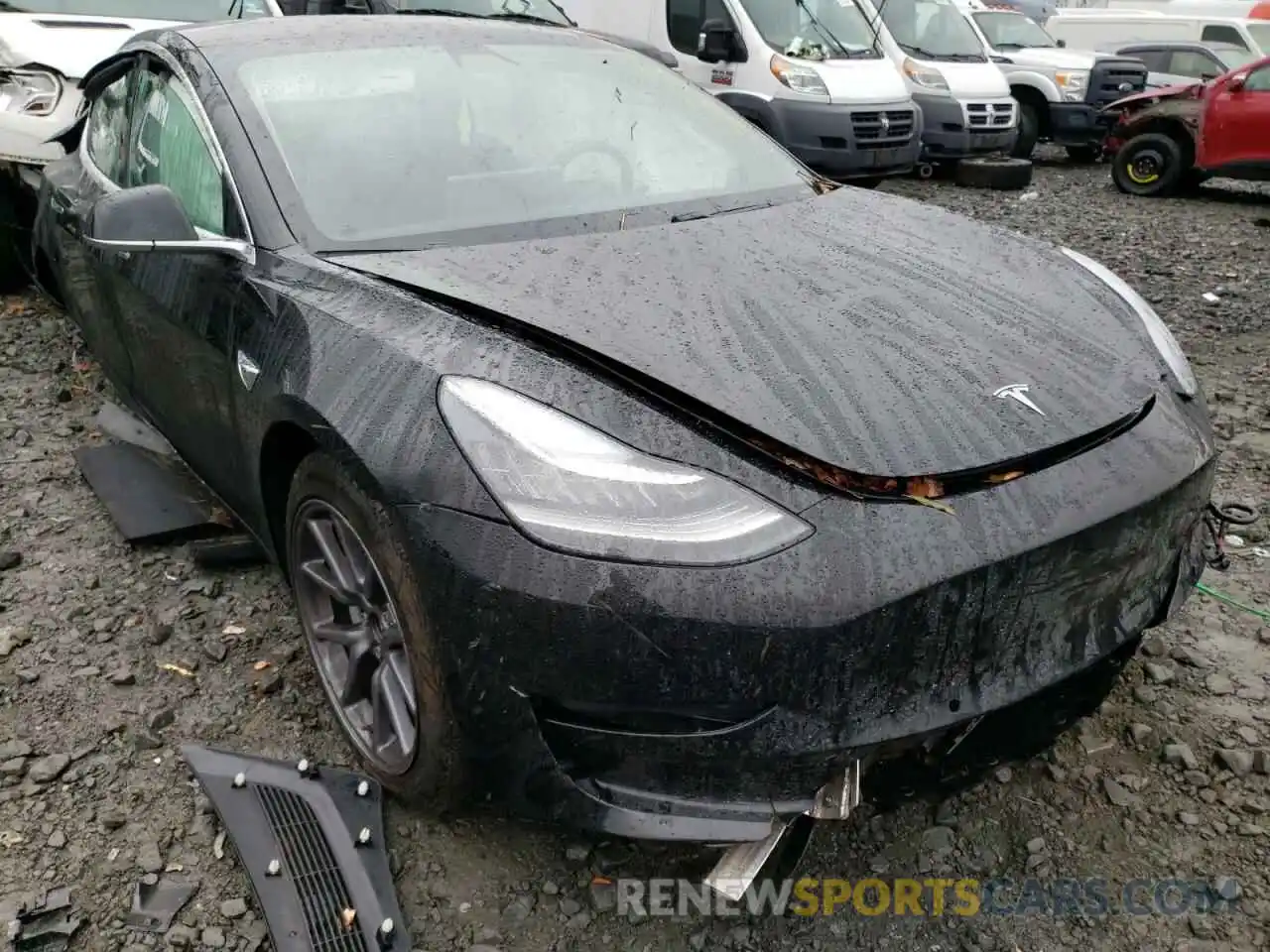 1 Photograph of a damaged car 5YJ3E1EA0KF306464 TESLA MODEL 3 2019