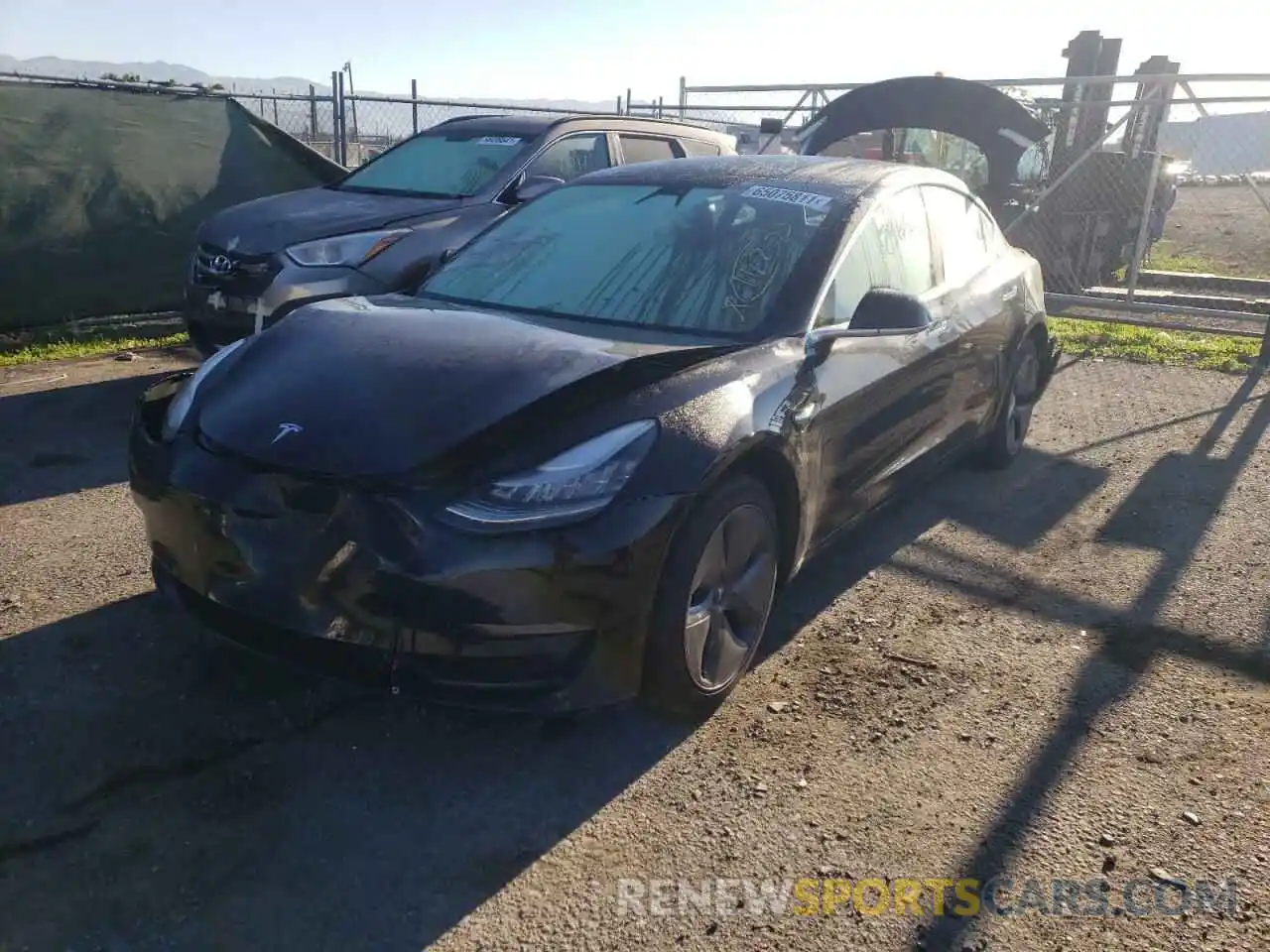 2 Photograph of a damaged car 5YJ3E1EA0KF317013 TESLA MODEL 3 2019