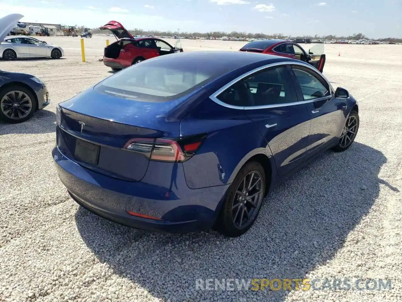 4 Photograph of a damaged car 5YJ3E1EA0KF332403 TESLA MODEL 3 2019