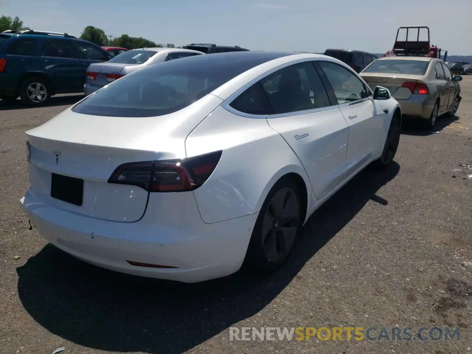 4 Photograph of a damaged car 5YJ3E1EA0KF401235 TESLA MODEL 3 2019