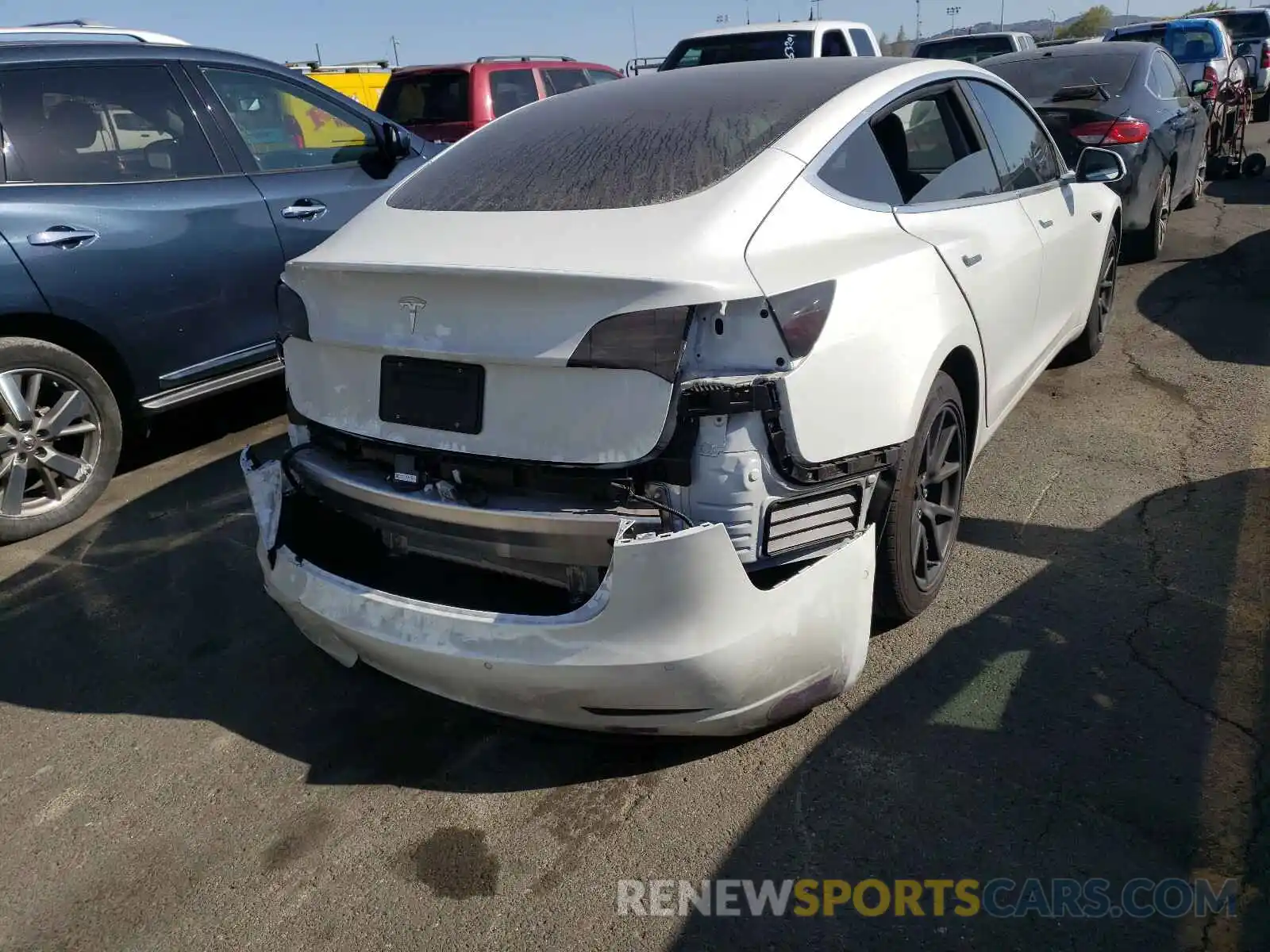 4 Photograph of a damaged car 5YJ3E1EA0KF401400 TESLA MODEL 3 2019