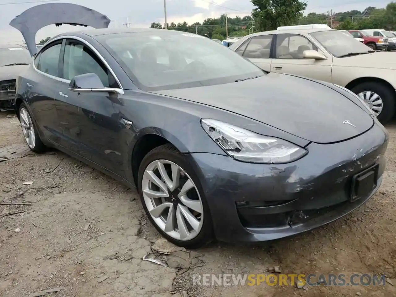 1 Photograph of a damaged car 5YJ3E1EA0KF402031 TESLA MODEL 3 2019