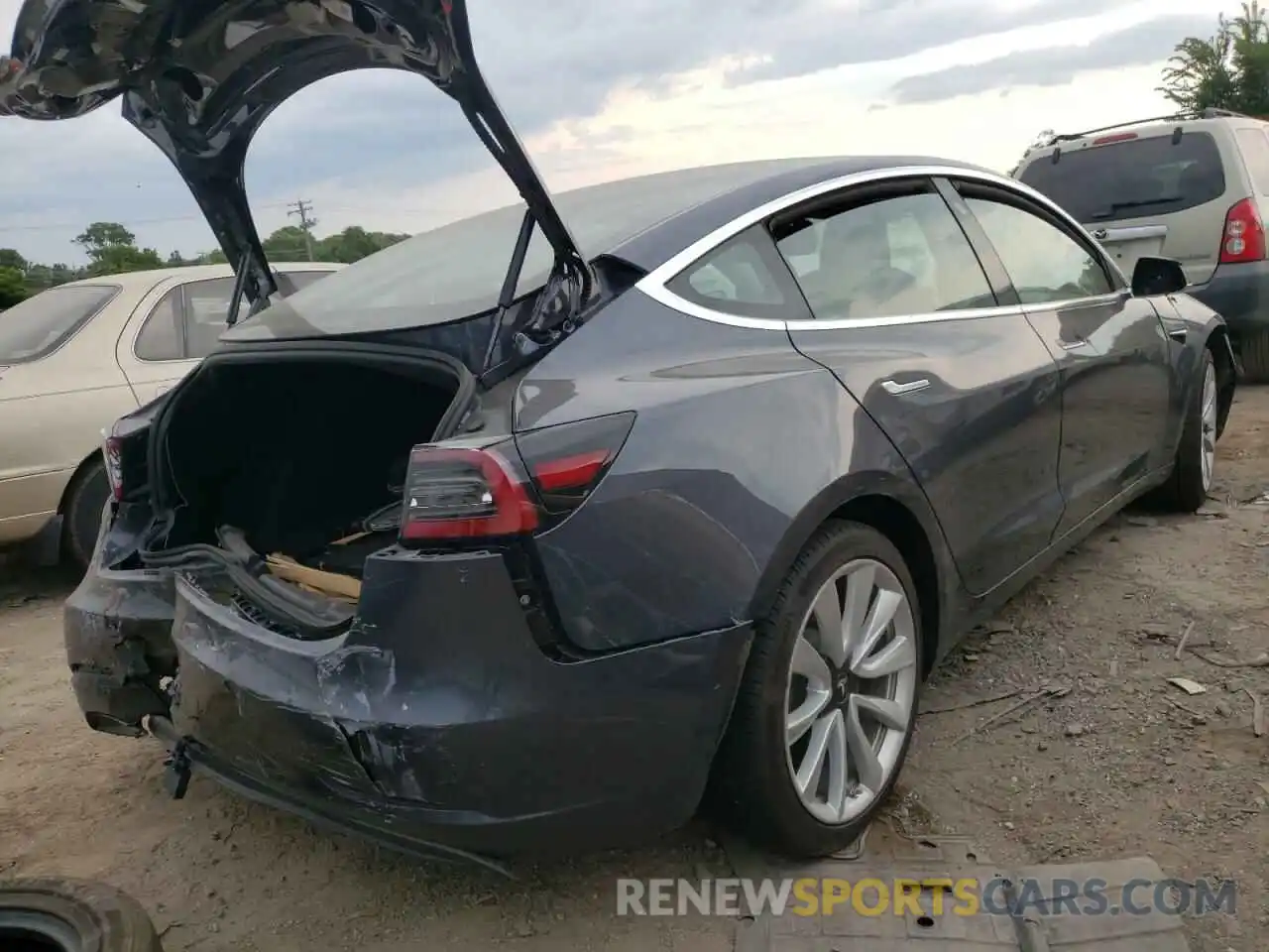 4 Photograph of a damaged car 5YJ3E1EA0KF402031 TESLA MODEL 3 2019