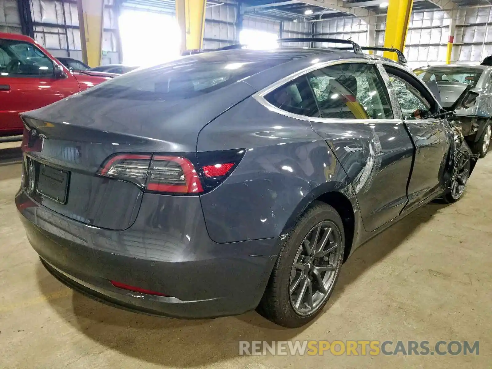 4 Photograph of a damaged car 5YJ3E1EA0KF411327 TESLA MODEL 3 2019