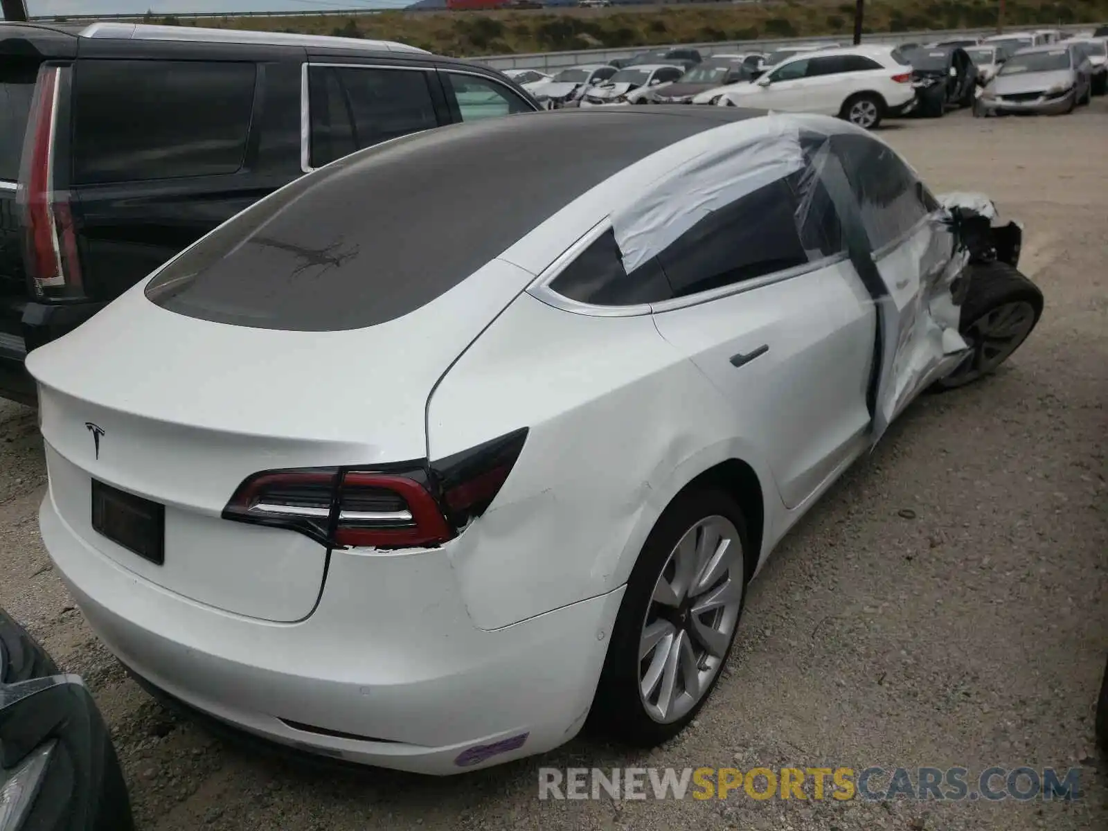 4 Photograph of a damaged car 5YJ3E1EA0KF428256 TESLA MODEL 3 2019