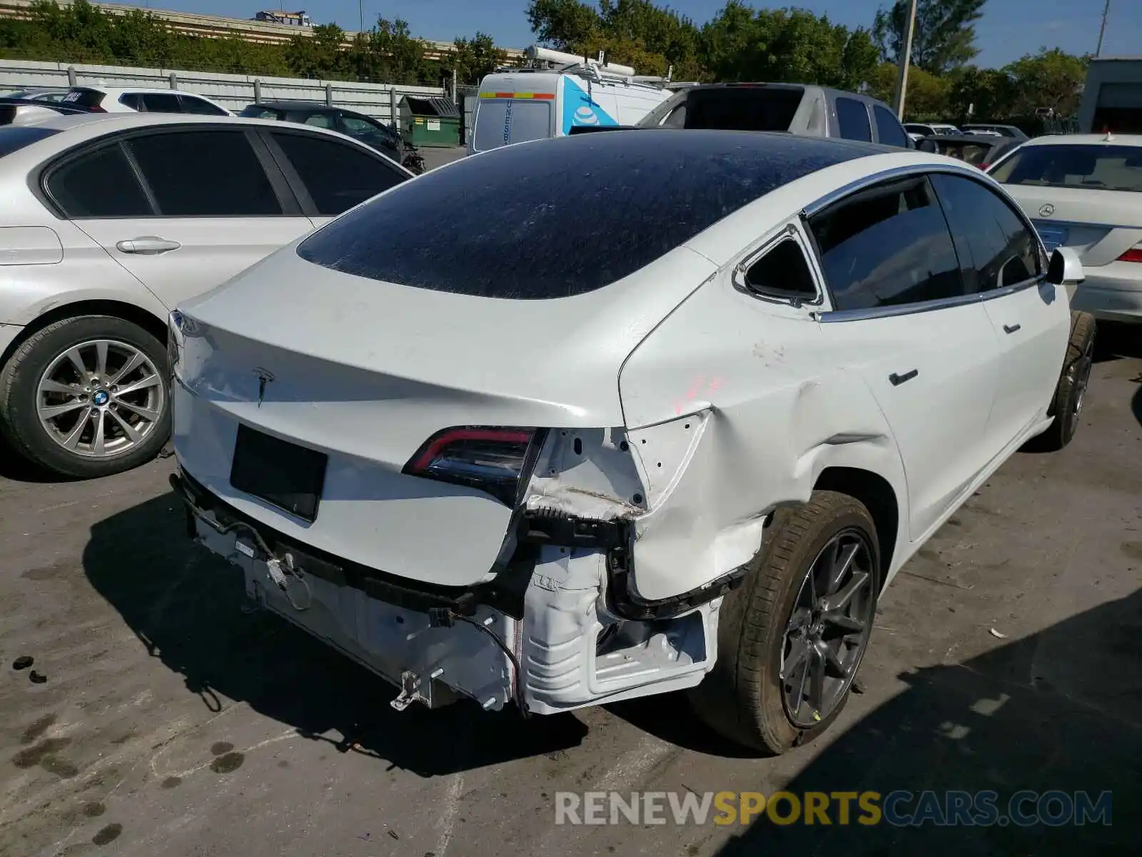 4 Photograph of a damaged car 5YJ3E1EA0KF486514 TESLA MODEL 3 2019