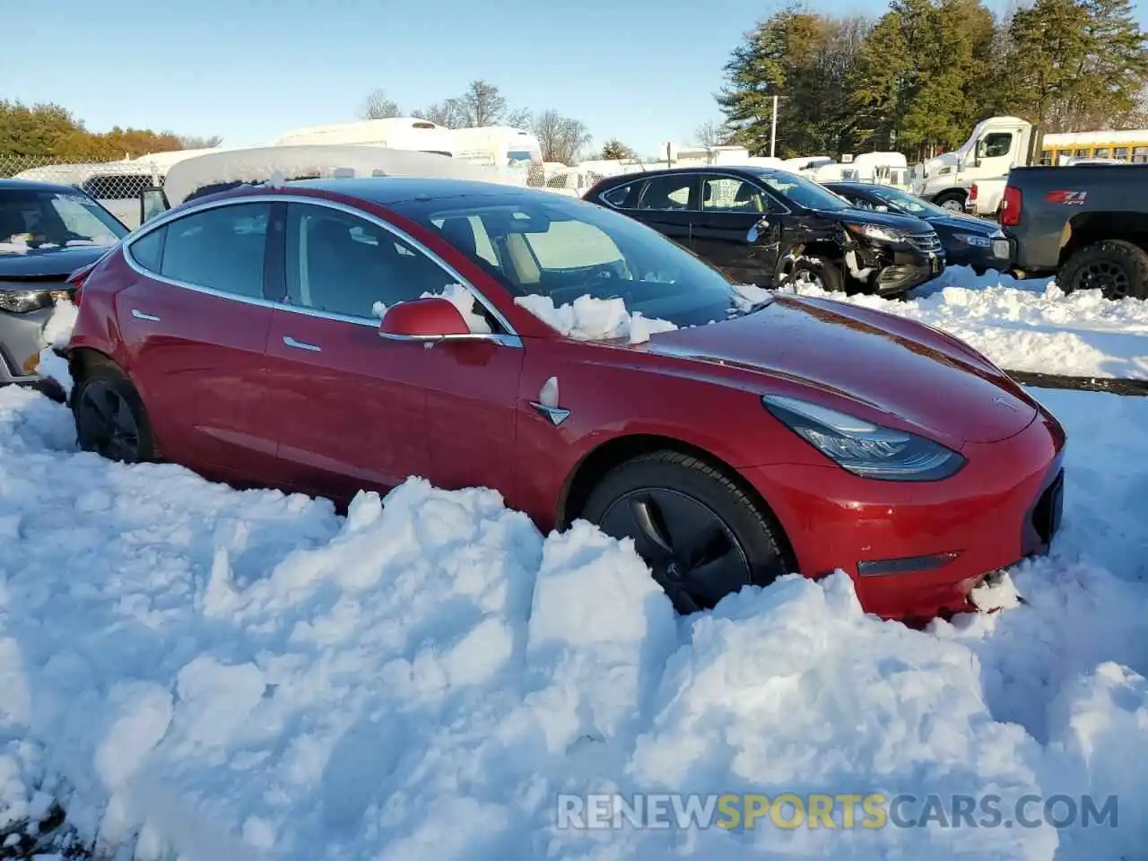 4 Photograph of a damaged car 5YJ3E1EA1KF308594 TESLA MODEL 3 2019