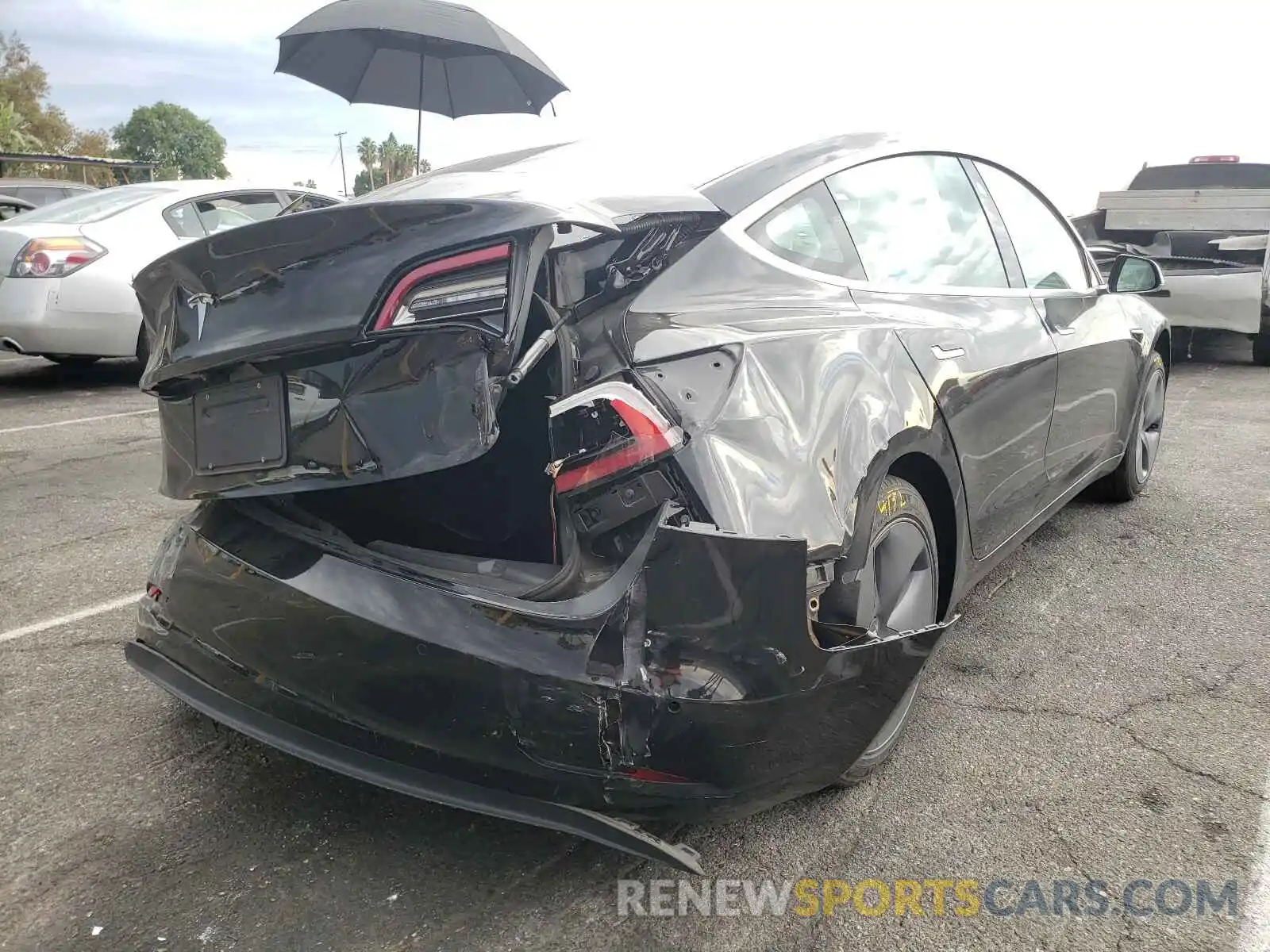 4 Photograph of a damaged car 5YJ3E1EA1KF394747 TESLA MODEL 3 2019