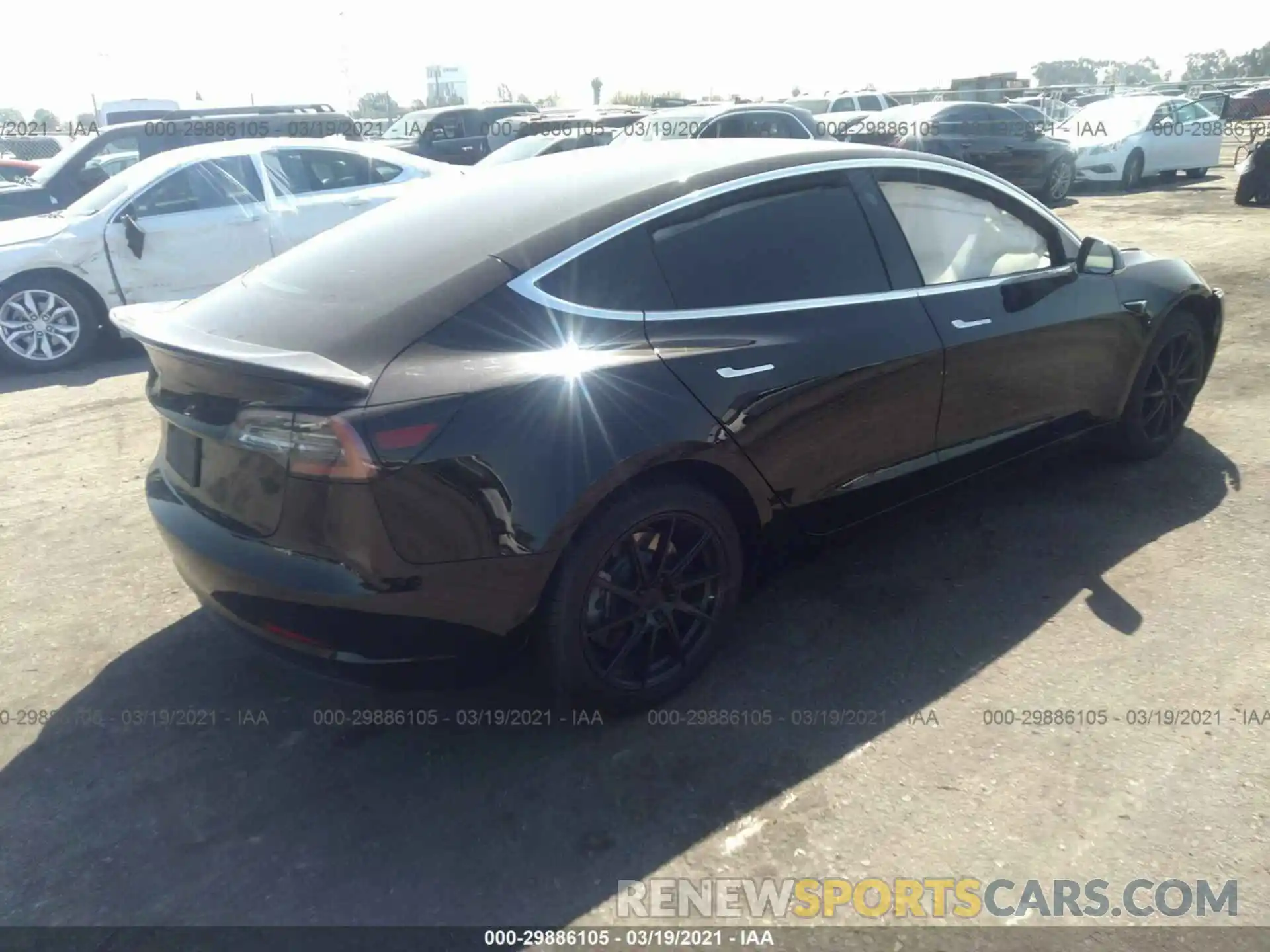 4 Photograph of a damaged car 5YJ3E1EA1KF398474 TESLA MODEL 3 2019