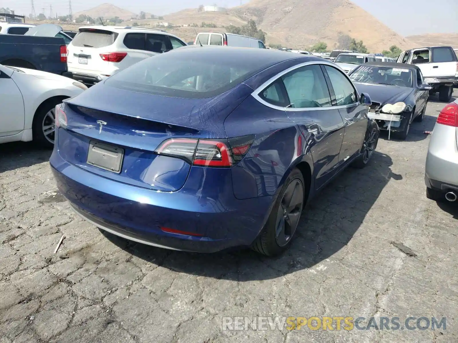 4 Photograph of a damaged car 5YJ3E1EA1KF400885 TESLA MODEL 3 2019