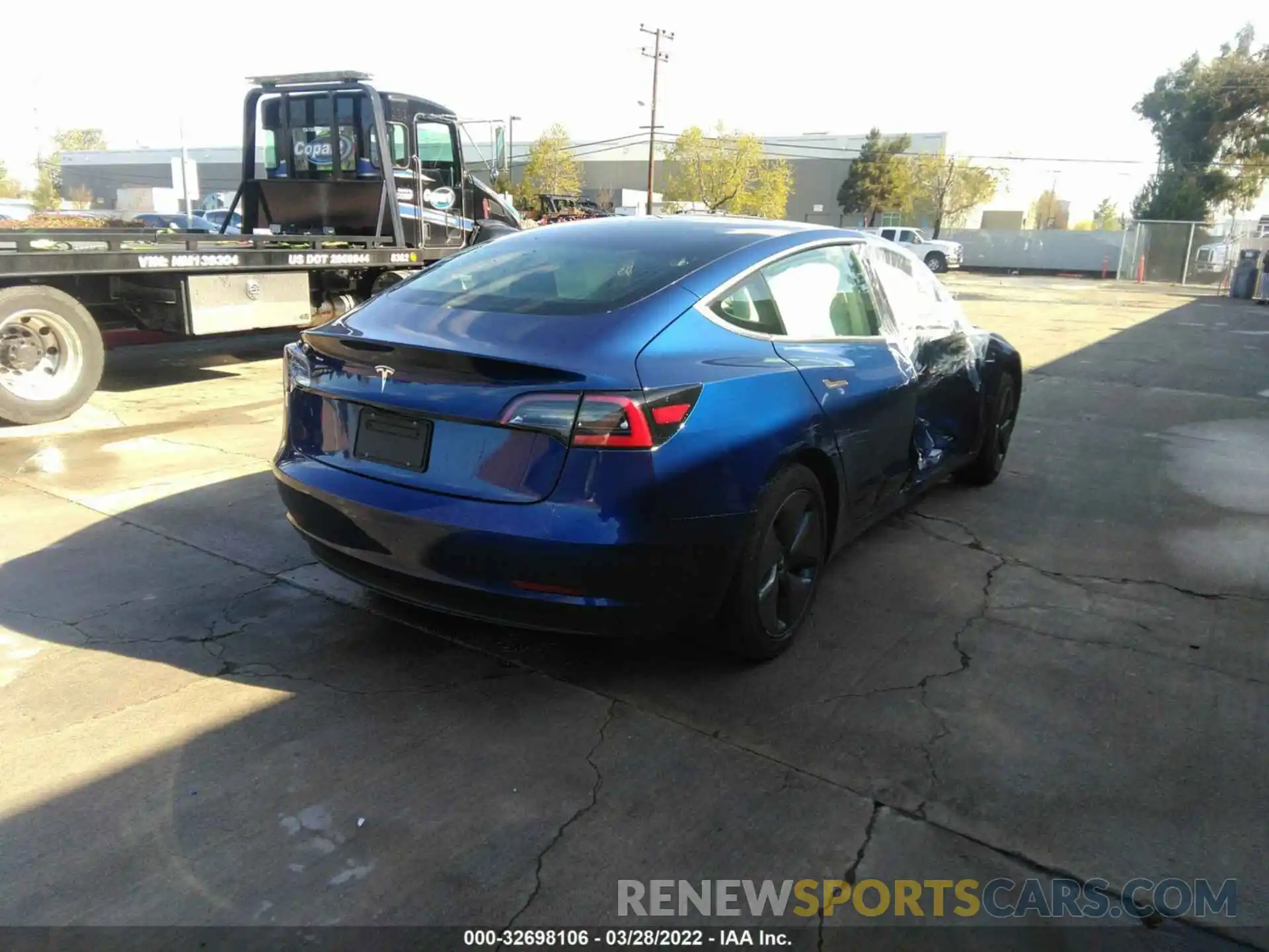 4 Photograph of a damaged car 5YJ3E1EA1KF411868 TESLA MODEL 3 2019