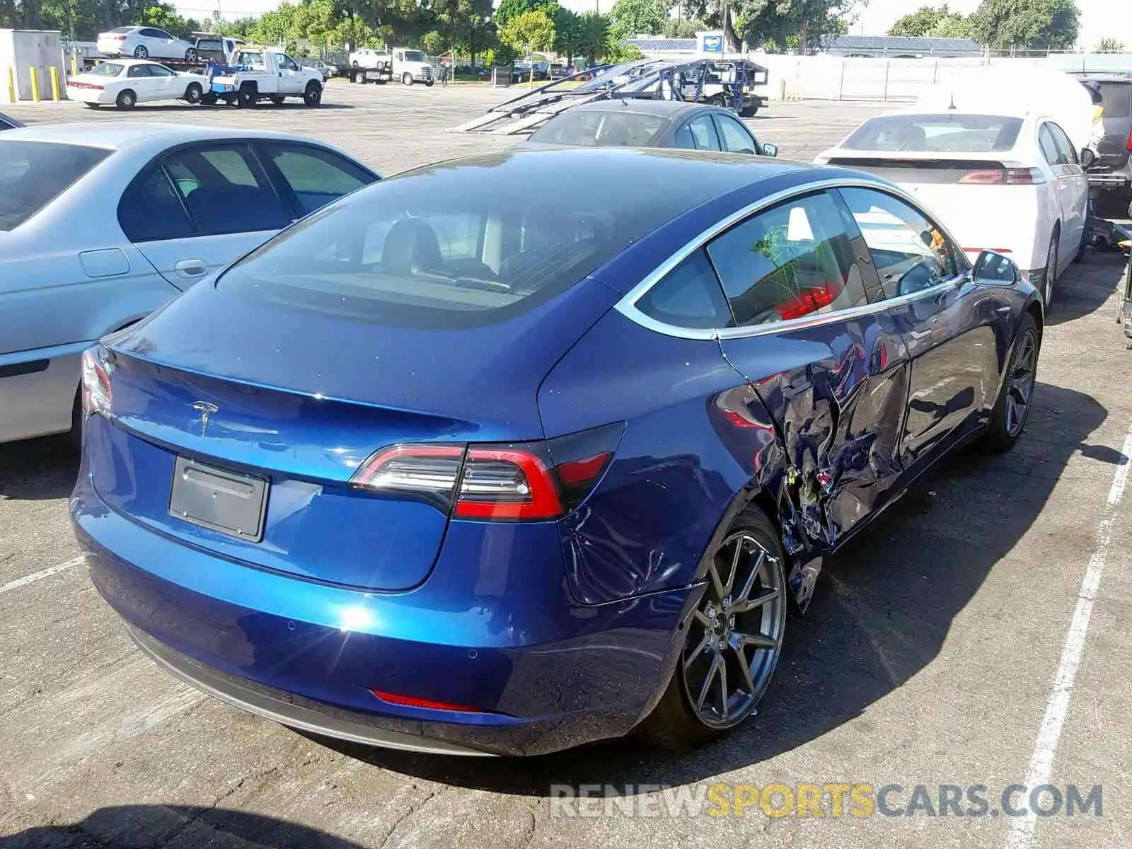 4 Photograph of a damaged car 5YJ3E1EA1KF424894 TESLA MODEL 3 2019