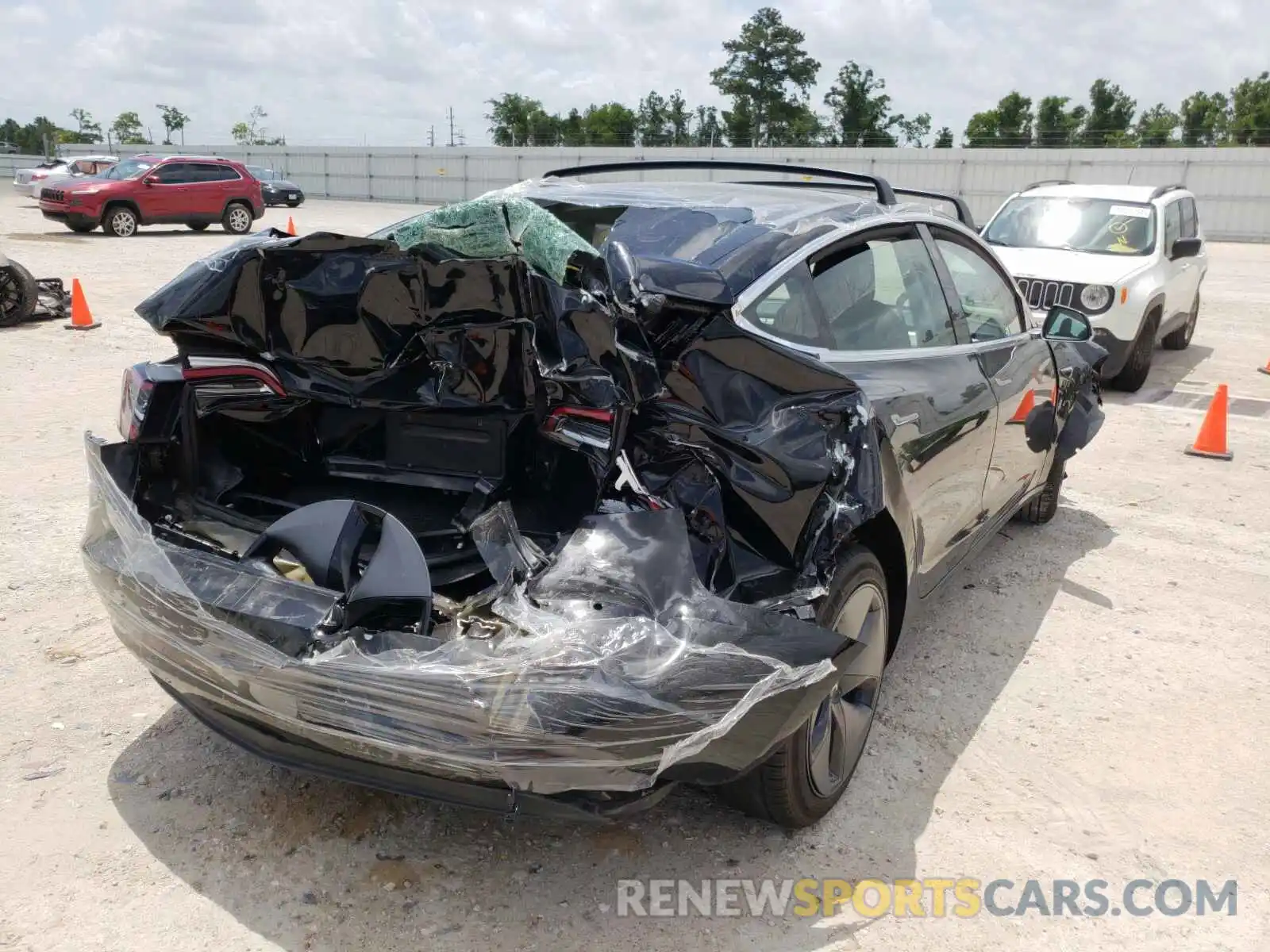 4 Photograph of a damaged car 5YJ3E1EA2KF297699 TESLA MODEL 3 2019