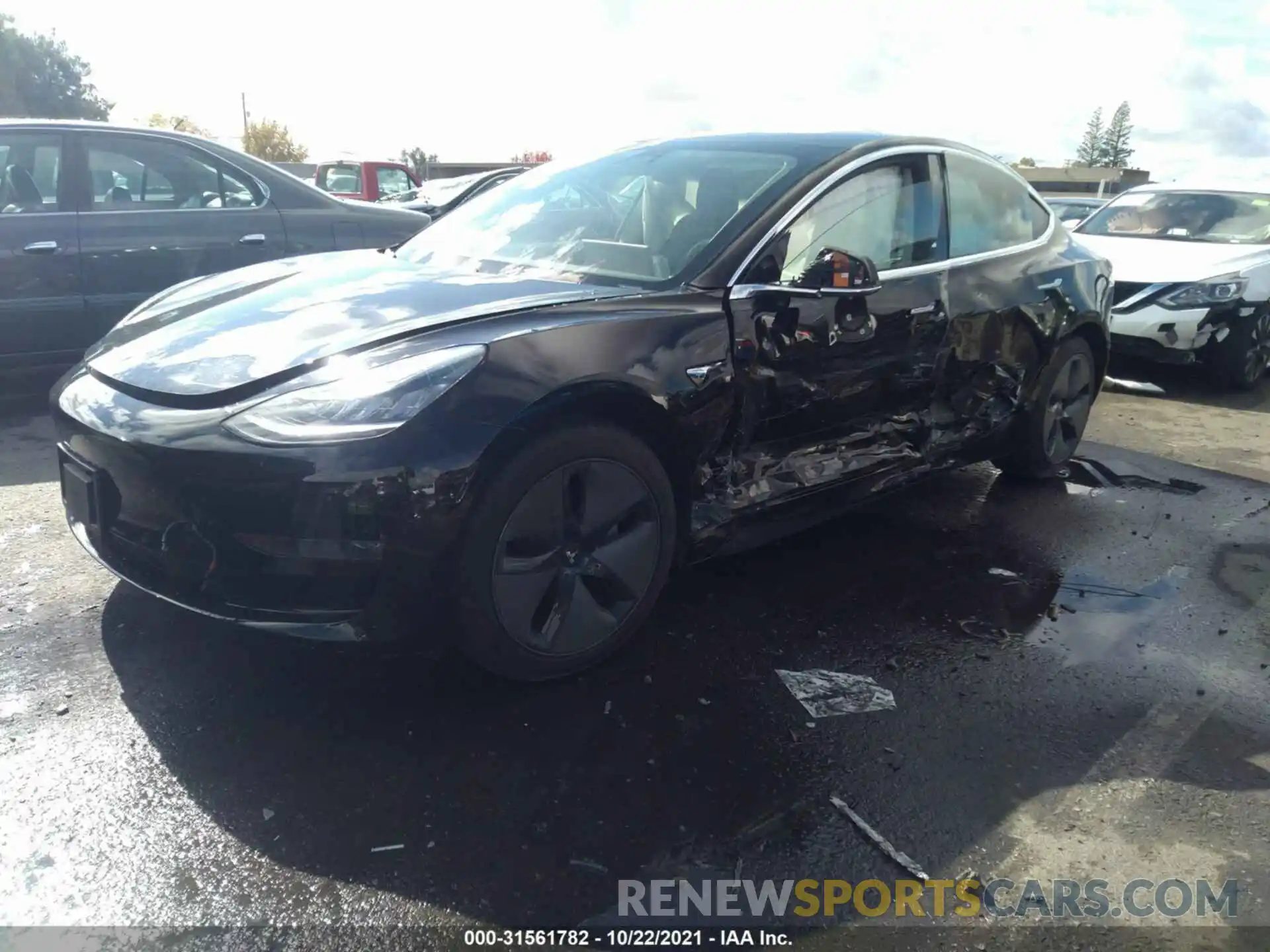 2 Photograph of a damaged car 5YJ3E1EA2KF304716 TESLA MODEL 3 2019