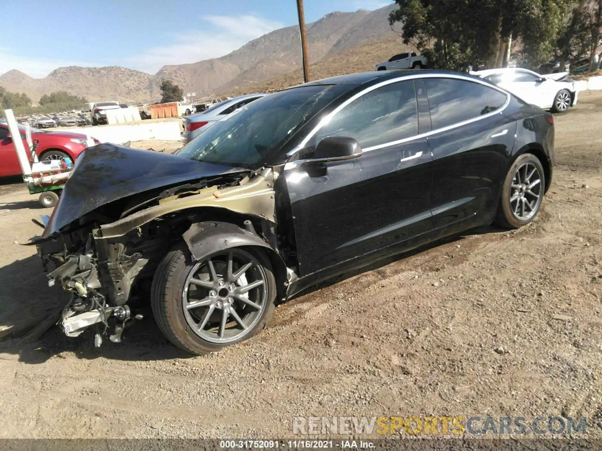 2 Photograph of a damaged car 5YJ3E1EA2KF410275 TESLA MODEL 3 2019