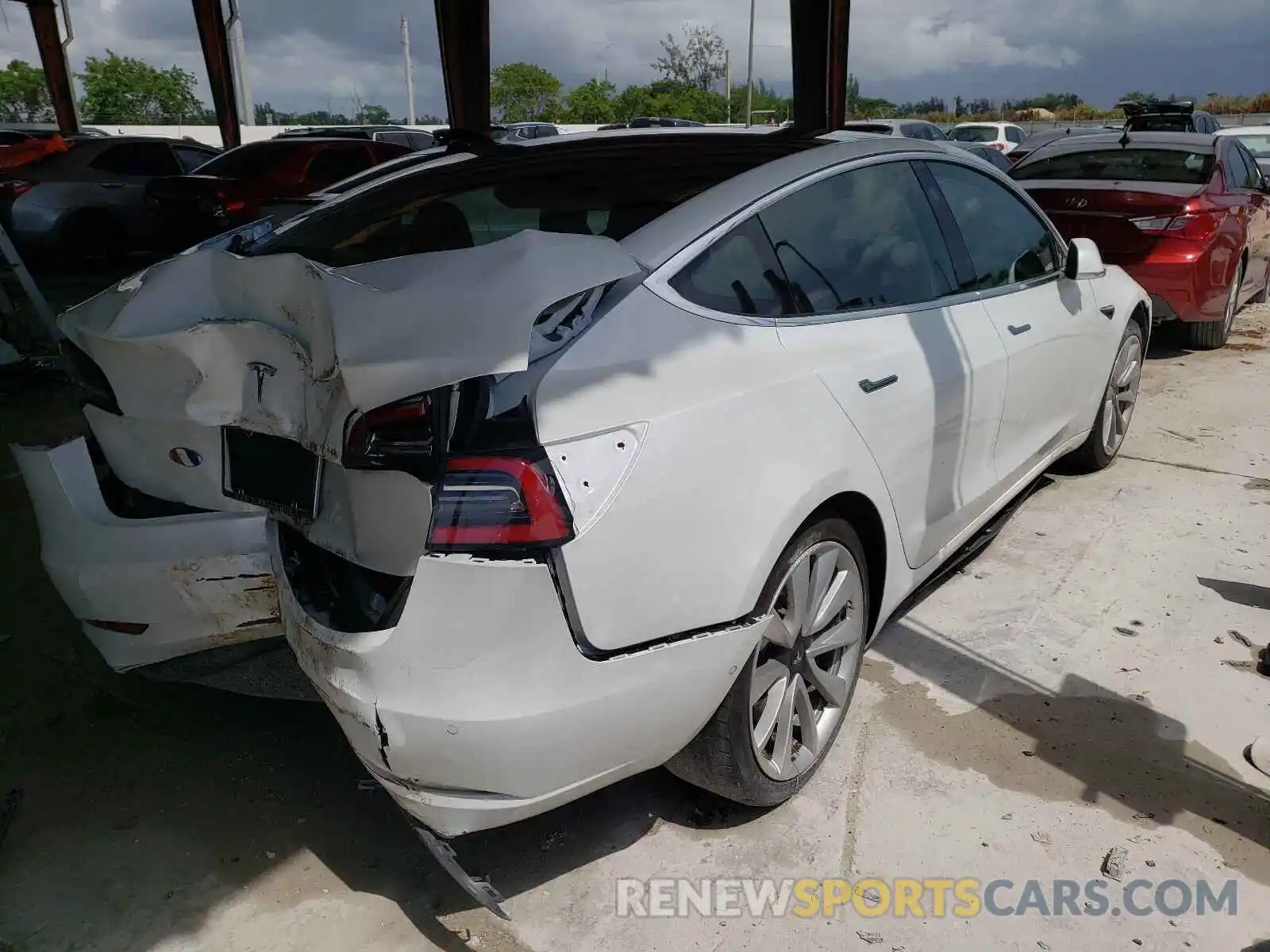 4 Photograph of a damaged car 5YJ3E1EA3KF311688 TESLA MODEL 3 2019