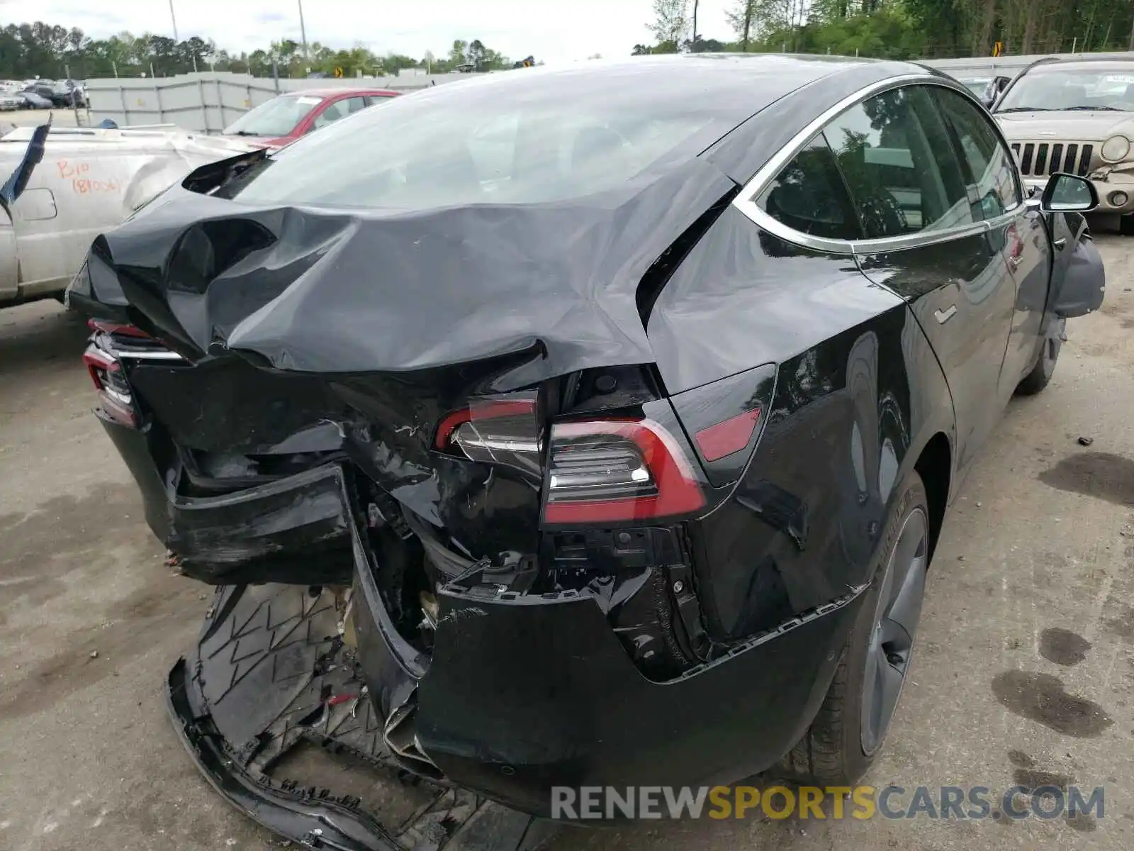 4 Photograph of a damaged car 5YJ3E1EA3KF482859 TESLA MODEL 3 2019