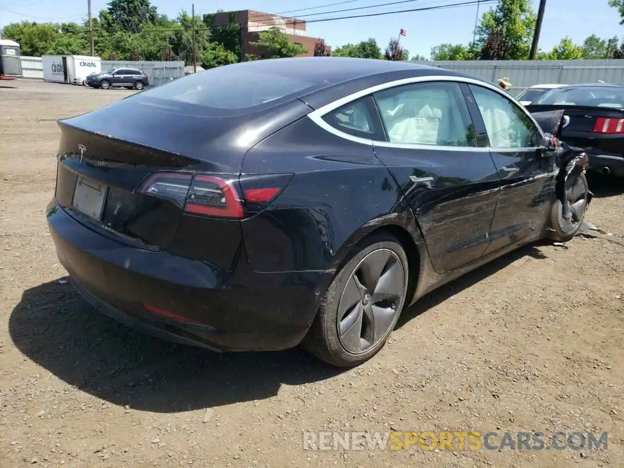 4 Photograph of a damaged car 5YJ3E1EA4KF306161 TESLA MODEL 3 2019