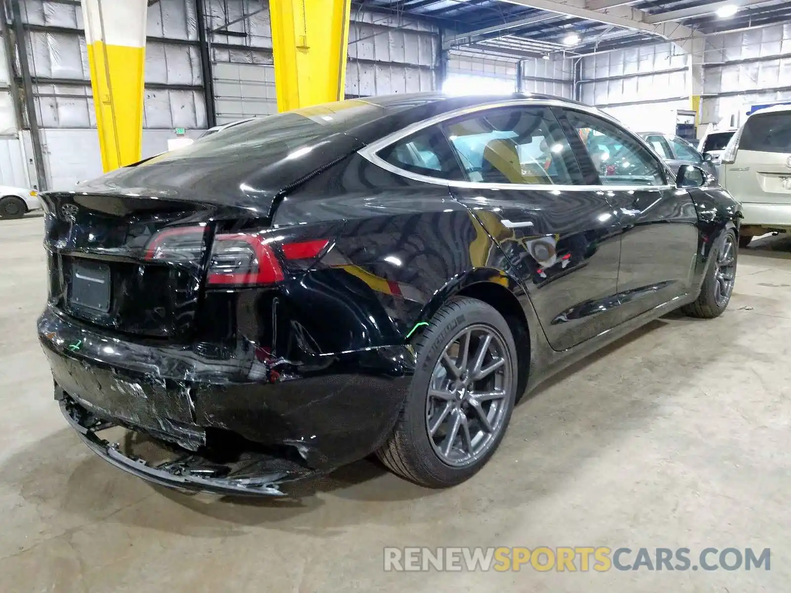 4 Photograph of a damaged car 5YJ3E1EA4KF410004 TESLA MODEL 3 2019