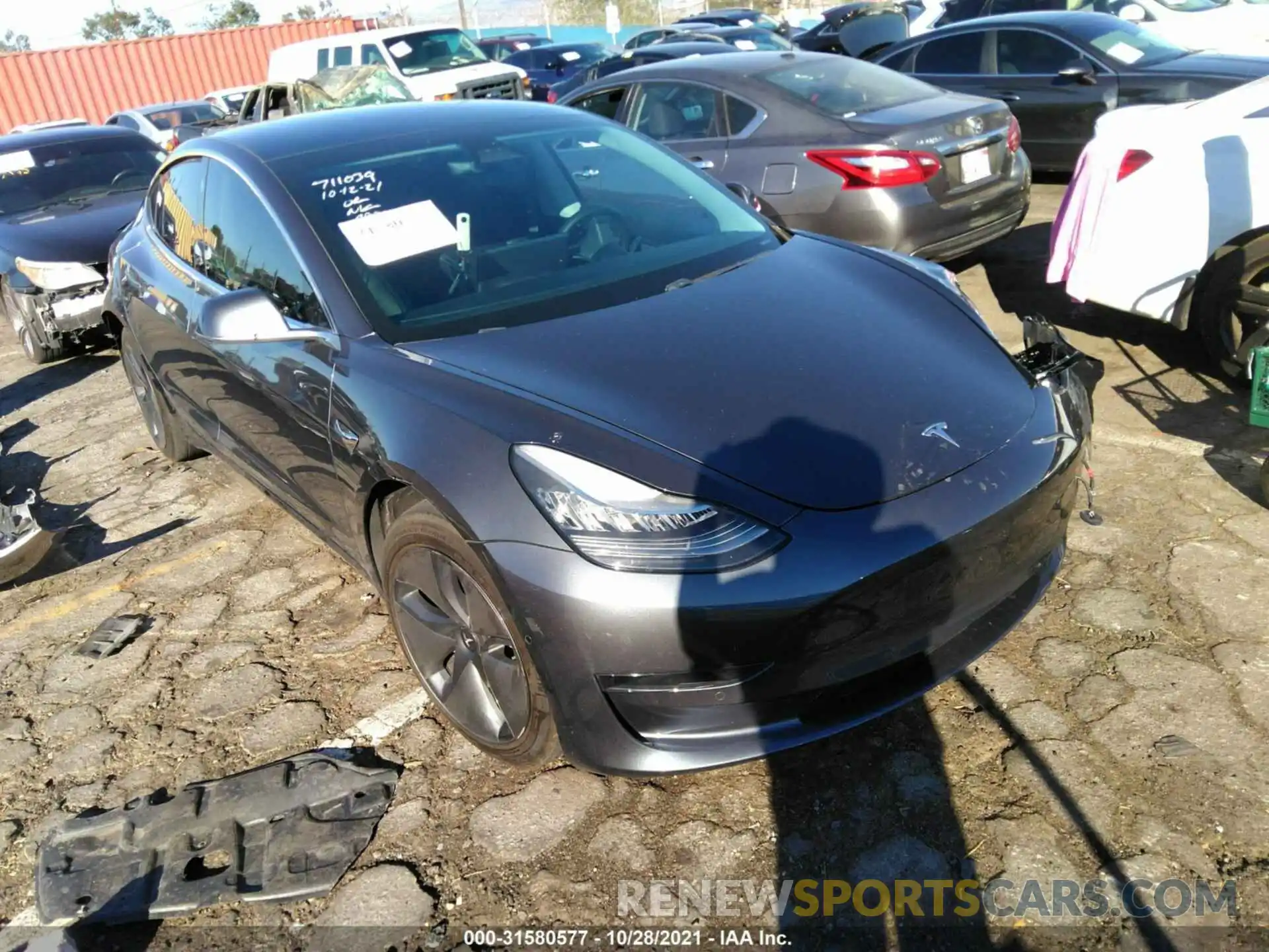 1 Photograph of a damaged car 5YJ3E1EA4KF411394 TESLA MODEL 3 2019