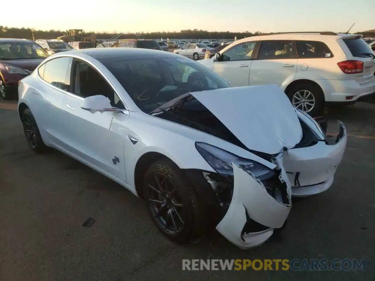 1 Photograph of a damaged car 5YJ3E1EA4KF424758 TESLA MODEL 3 2019