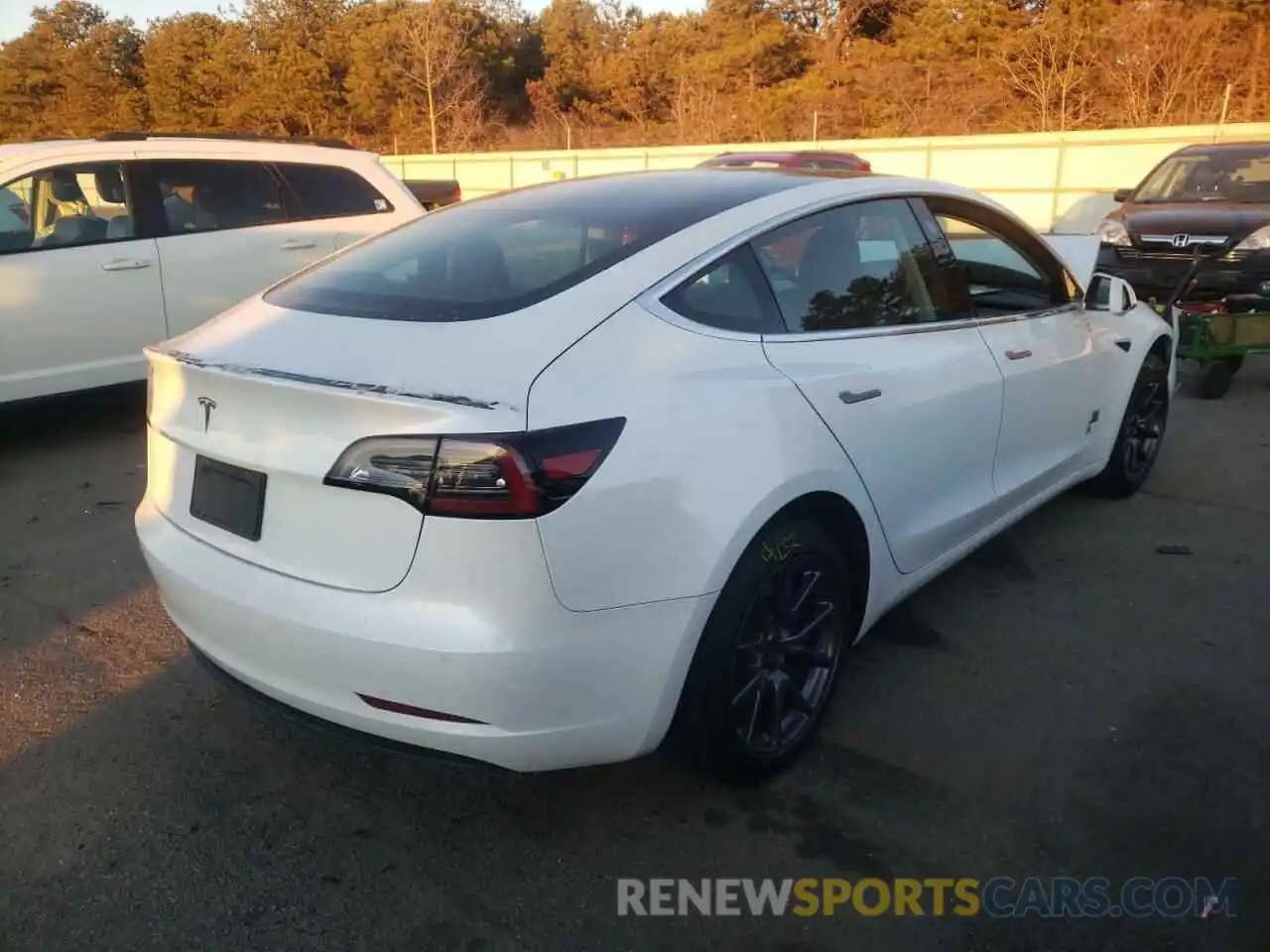 4 Photograph of a damaged car 5YJ3E1EA4KF424758 TESLA MODEL 3 2019