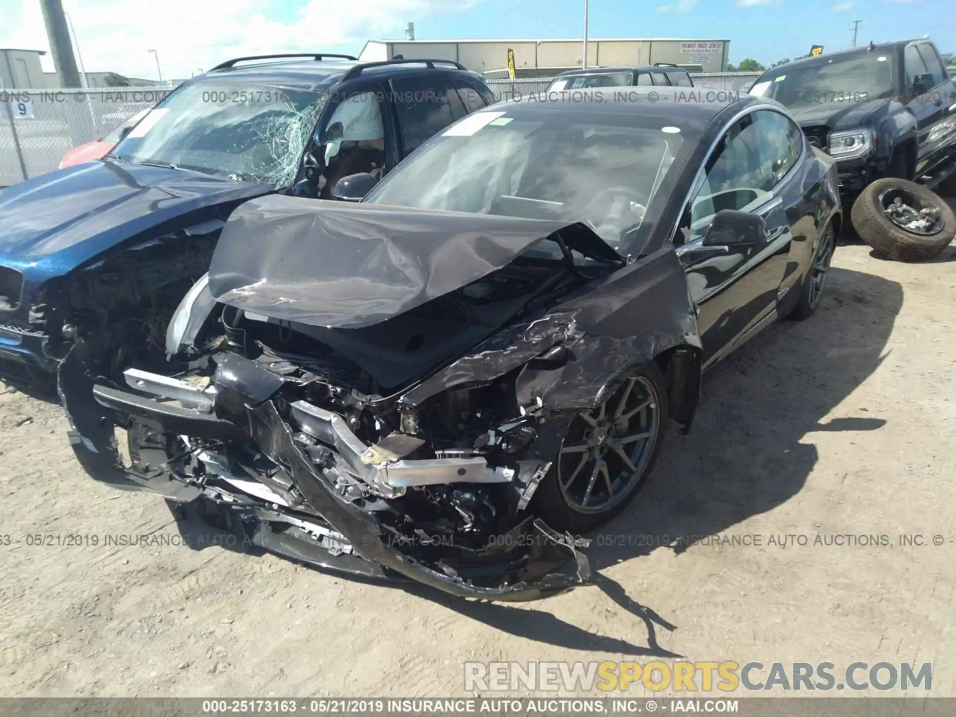 2 Photograph of a damaged car 5YJ3E1EA5KF304306 TESLA MODEL 3 2019