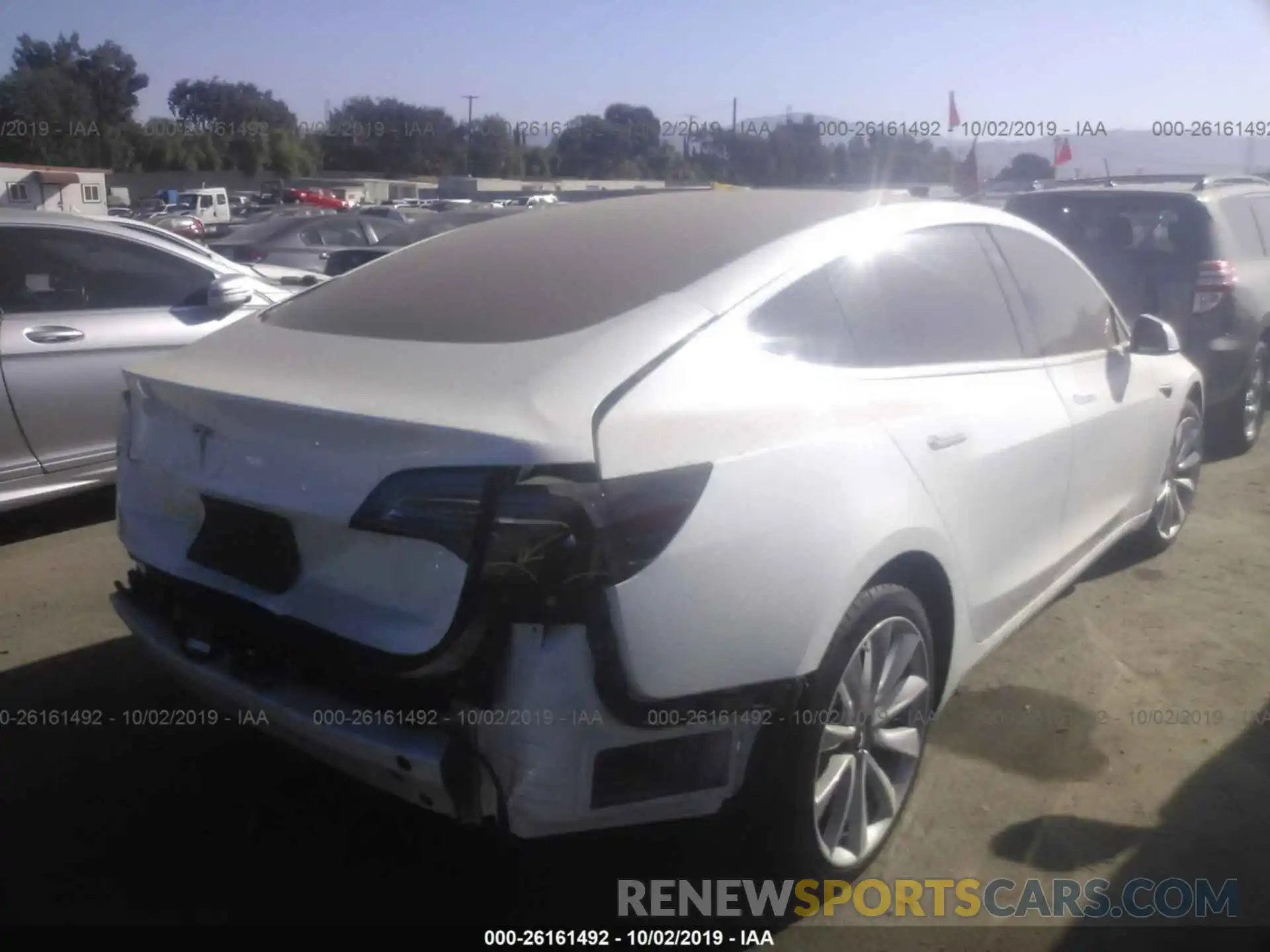 4 Photograph of a damaged car 5YJ3E1EA5KF311692 TESLA MODEL 3 2019